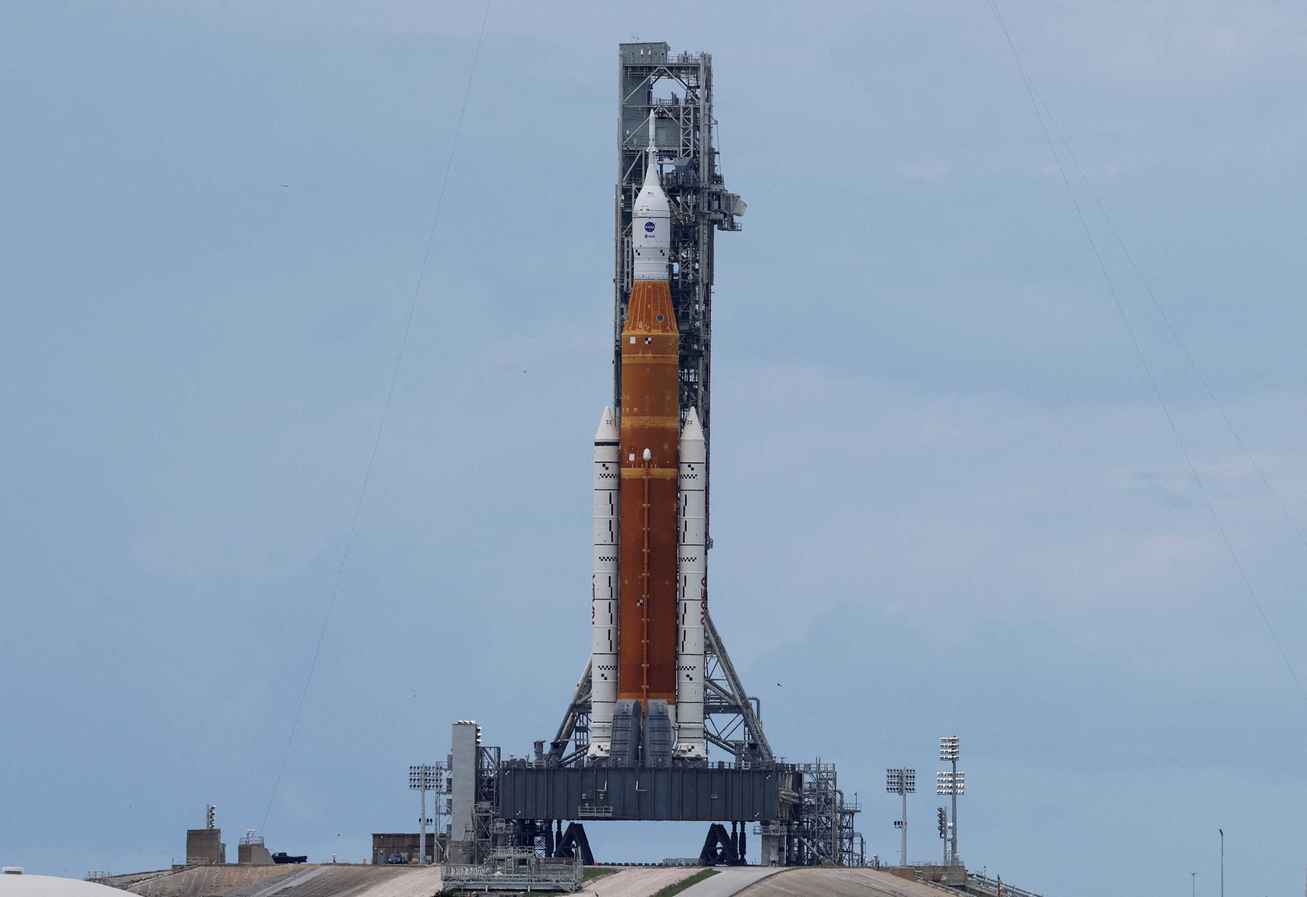A view of NASA's next-generation moon rocket, the Space Launch System (SLS) rocket with its Orion crew capsule perched on top, as it stands on launch pad 39B in preparation for the unmanned Artemis 1 mission at Cape Canaveral, Florida, U.S. August 28, 2022. REUTERS
