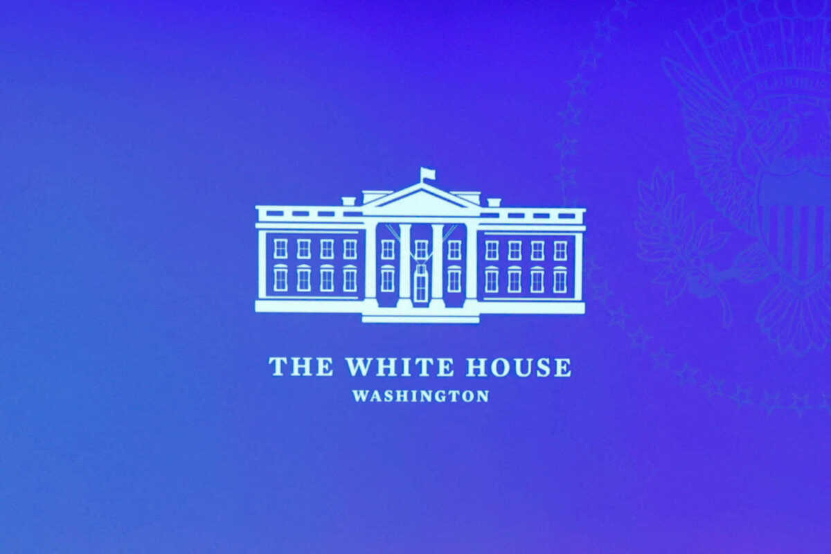 An image is displayed on a screen before U.S. President Joe Biden appears to meet virtually with a delegation from SK Group, led by Chairman Chey Tae-won, to talk about SK's plans for $22 billion in new investments in the U.S. in semiconductors, green energy and bioscience projects, from the Roosevelt Room at the White House in Washington, U.S. July 26, 2022.  REUTERS