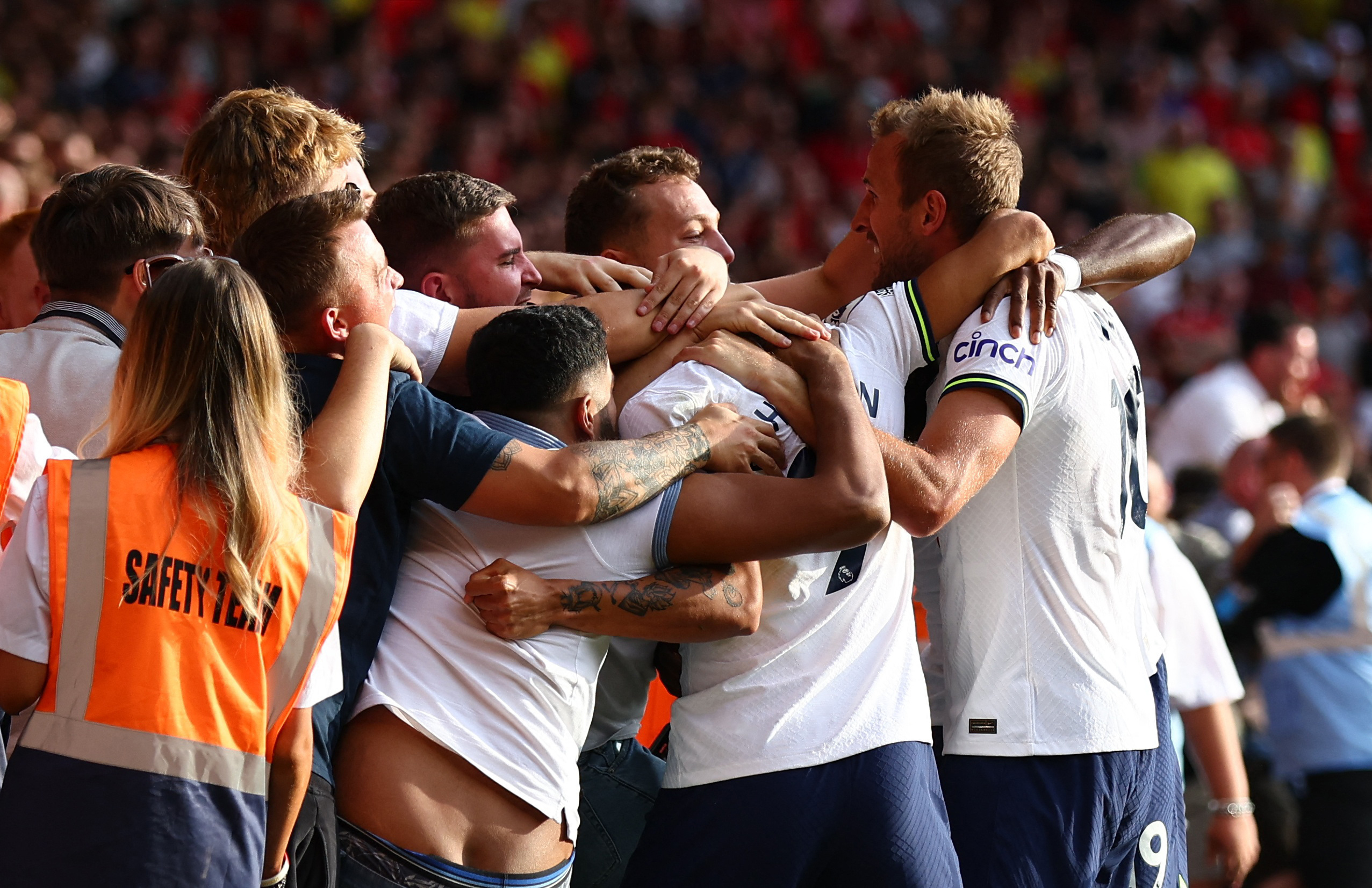 Soccer Football - Premier League - Nottingham Forest v Tottenham Hotspur - The City Ground, Nottingham, Britain - August 28, 2022 Tottenham Hotspur's Harry Kane celebrates scoring their second goal with Richarlison and Ryan Sessegnon in front of their fans REUTERS