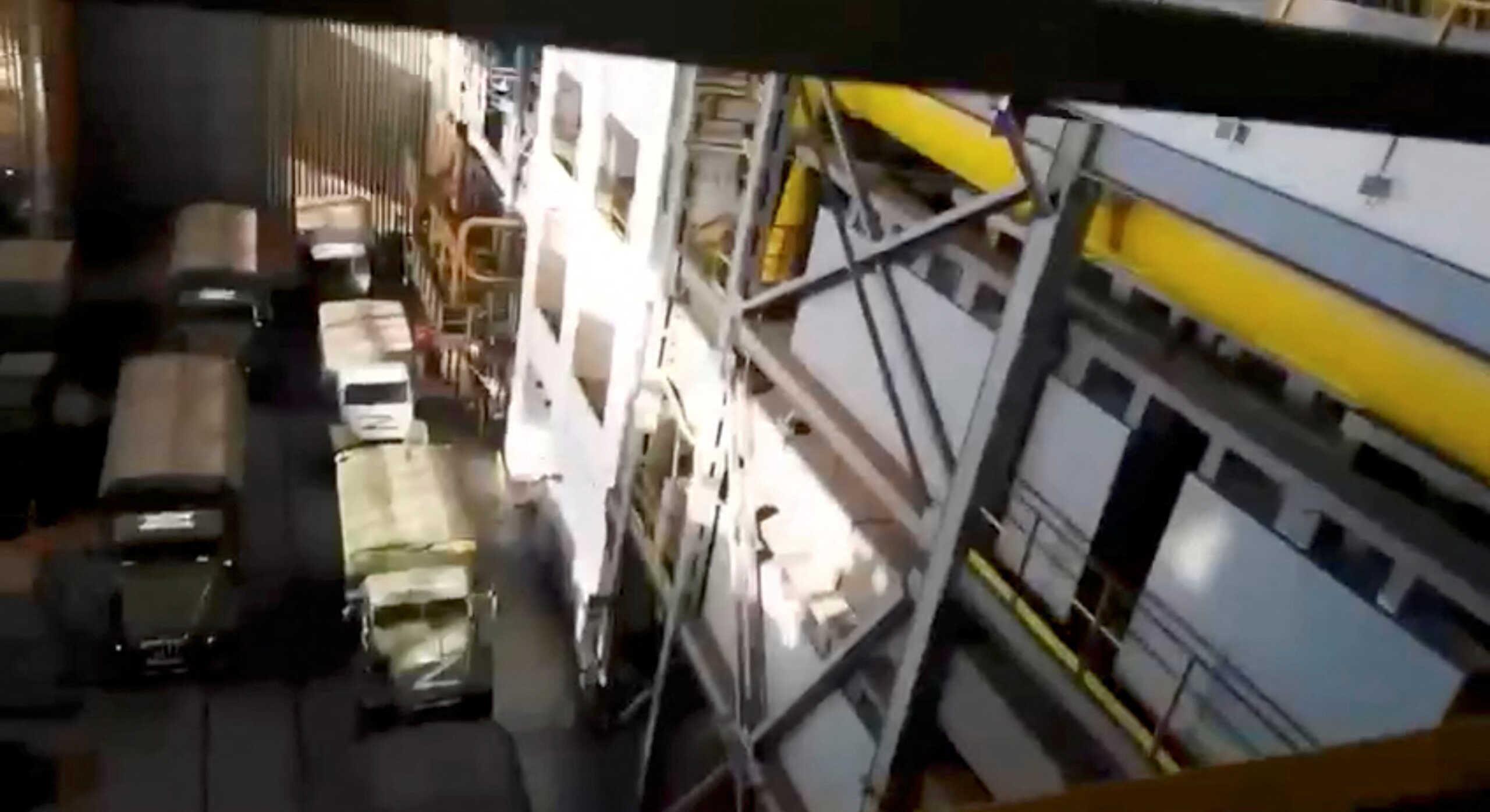 Vehicles marked with the letter 'Z' are parked at Zaporizhzhia Nuclear Power Plant, as Russia's attack on Ukraine continues, near the city of Enerhodar, Ukraine, in this screengrab from a video released August 18, 2022 and obtained by REUTERS    THIS IMAGE HAS BEEN SUPPLIED BY A THIRD PARTY. NO RESALES. NO ARCHIVES.