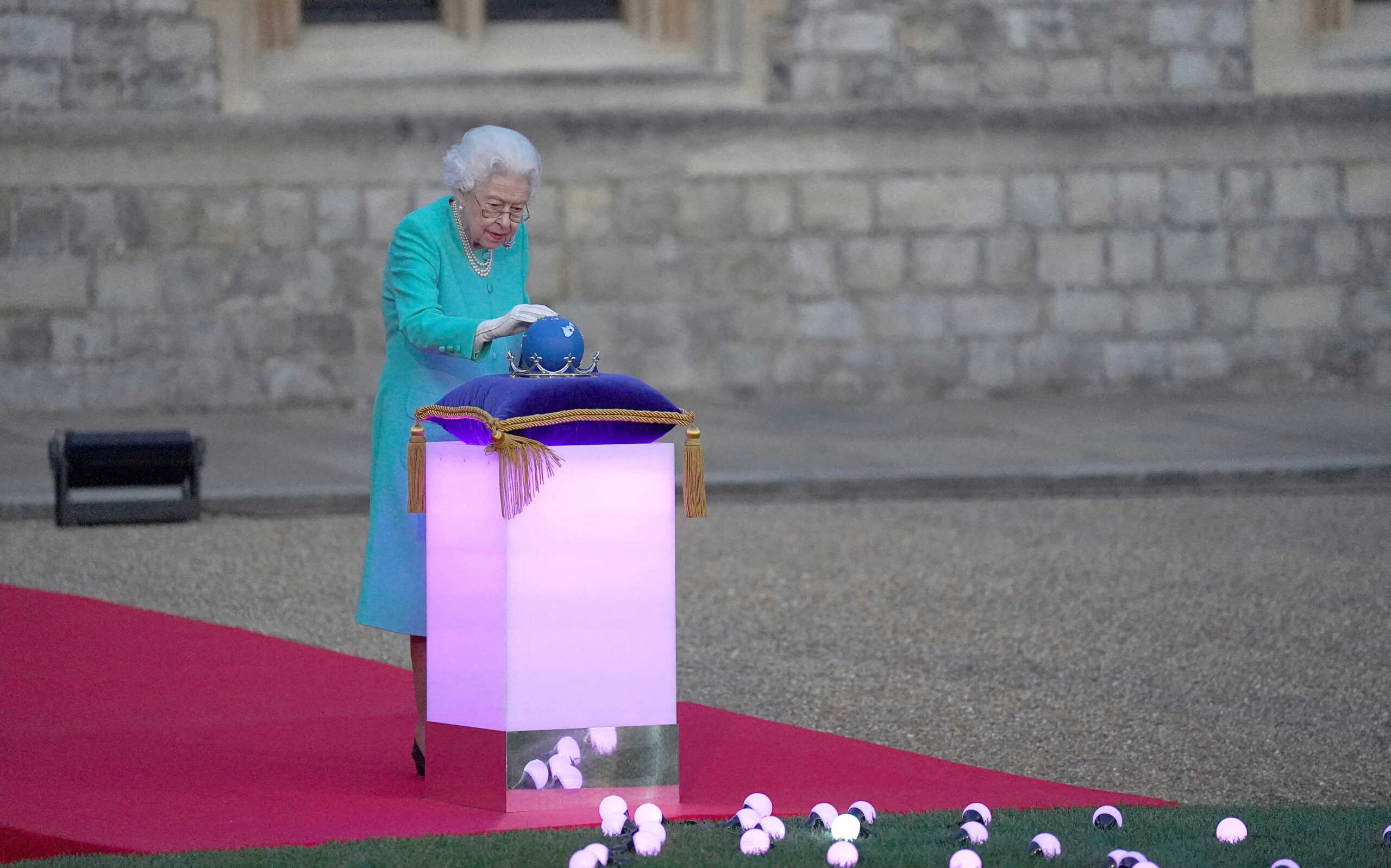 FILE PHOTO: Britain's Queen Elizabeth leads the lighting of the principal Jubilee beacon, as part of Platinum Jubilee celebrations, at Windsor Castle, Britain, June 2, 2022. Steve Parsons