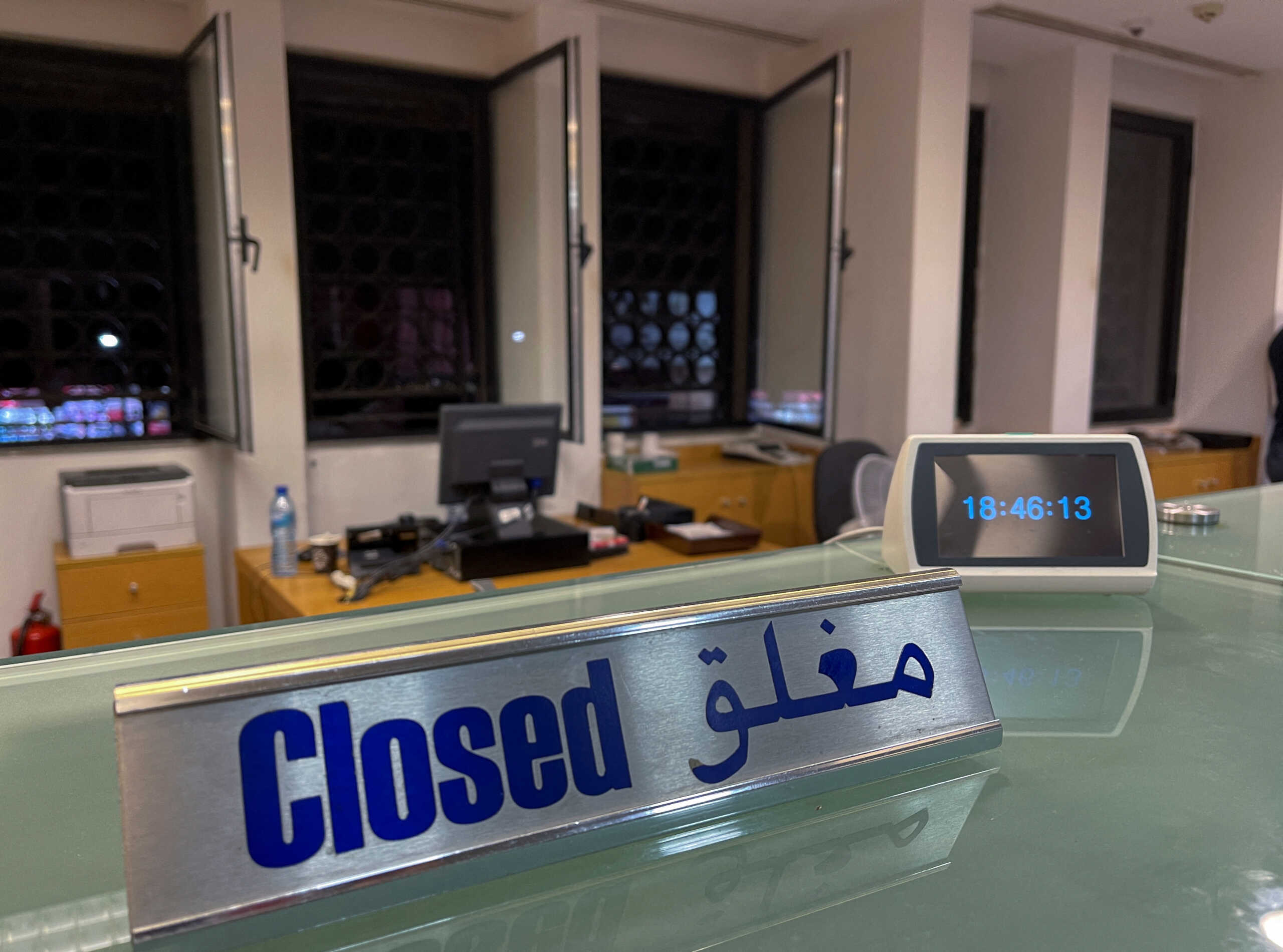 A closed sign is pictured inside a Blom Bank branch, which was held up by depositor Abed Soubra seeking access to his own savings, in the Tariq al-Jdideh neighborhood in Beirut, Lebanon September 16, 2022. REUTERS