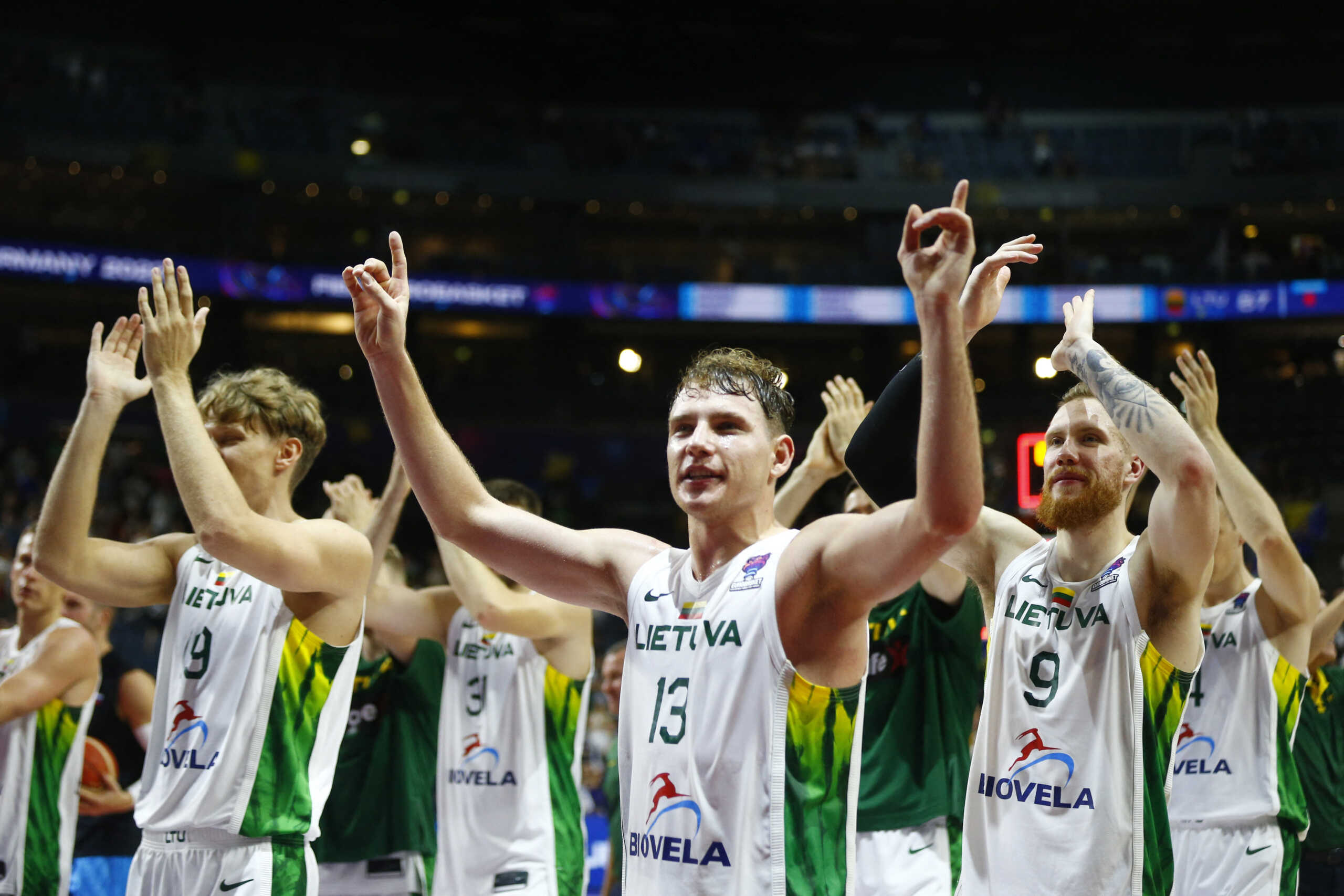 Basketball - EuroBasket Championship - Group B - Lithuania v Bosnia and Herzegovina - Cologne Arena, Cologne, Germany - September 7, 2022 Lithuania's Rokas Jokubaitis and teammates applaud fans after the match REUTERS