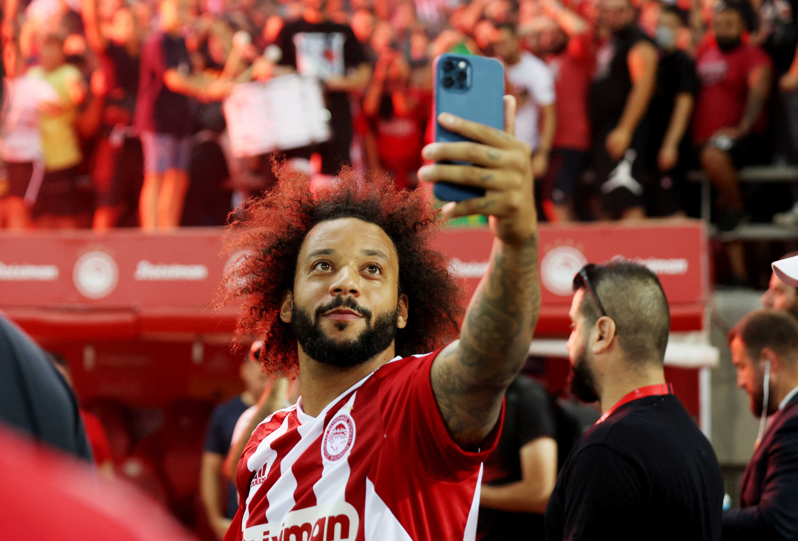 Soccer Football - Olympiacos - Marcelo Presentation - Karaiskaki Stadium, Piraeus, Greece - September 5, 2022 Olympiacos' Marcelo takes a selfie during the presentation REUTERS