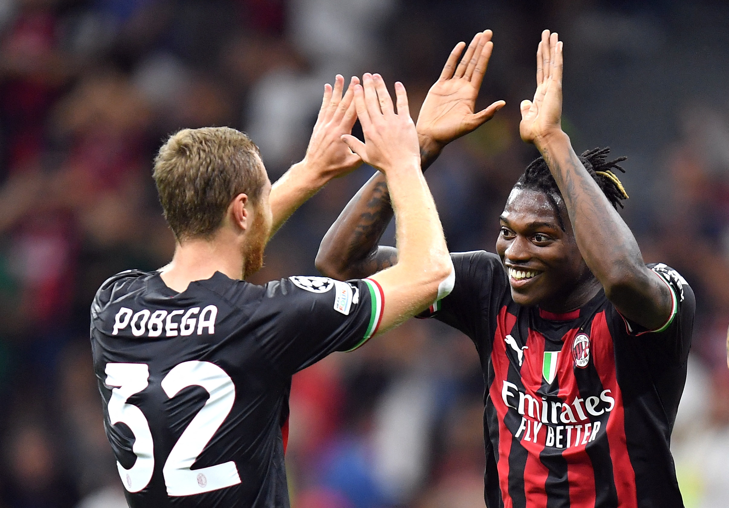 Soccer Football - Champions League - Group E - AC Milan v Dinamo Zagreb - San Siro, Milan, Italy - September 14, 2022 AC Milan's Tommaso Pobega celebrates scoring their third goal with AC Milan's Rafael Leao REUTERS