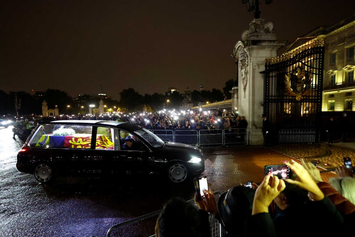 The hearse carrying the coffin of Britain's Queen Elizabeth arrives at the Buckingham Palace, following her death, in London, Britain September 13, 2022. REUTERS