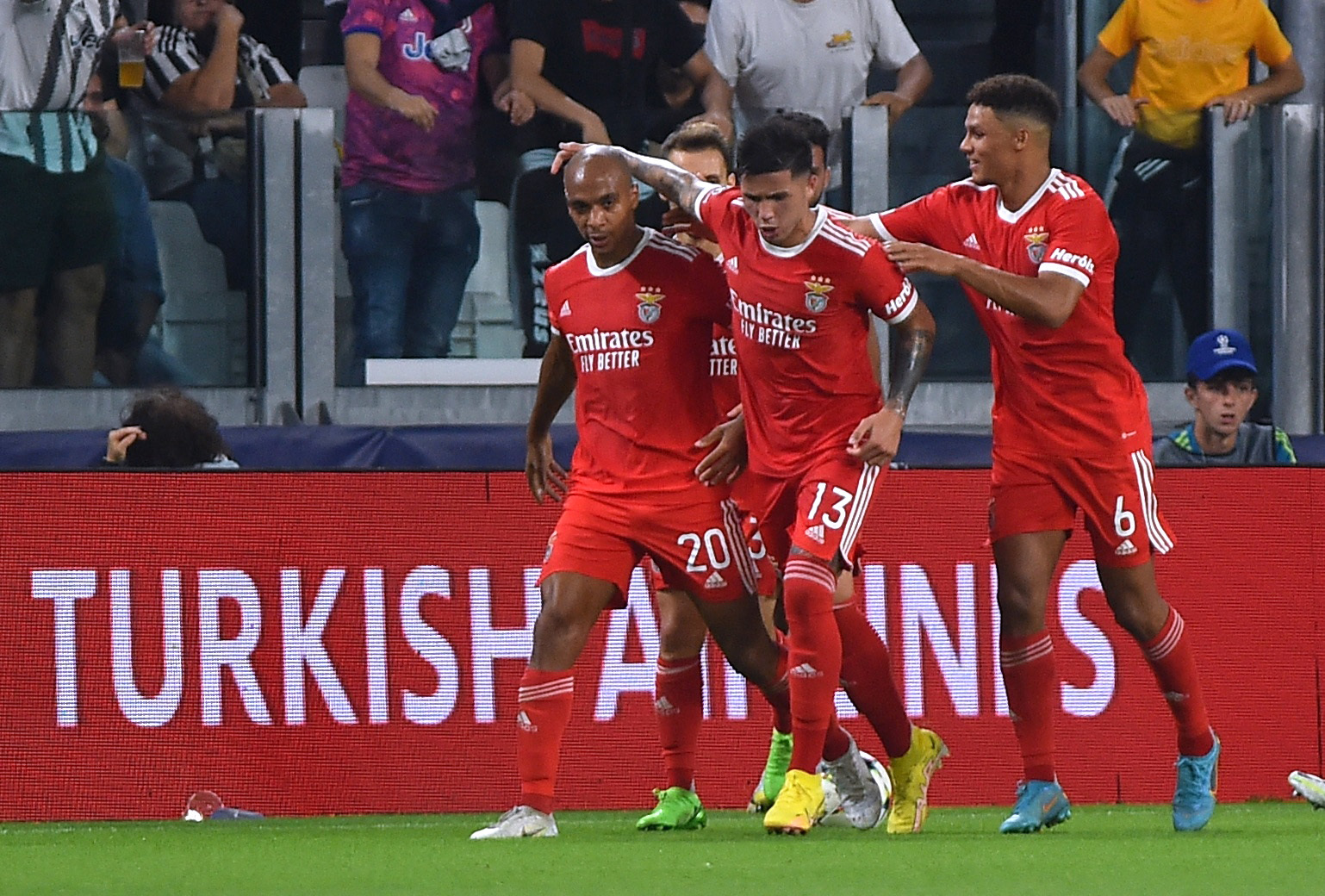 Soccer Football - Champions League - Group H - Juventus v Benfica - Allianz Stadium, Turin, Italy - September 14, 2022 Benfica's Joao Mario celebrates scoring their first goal with teammates REUTERS