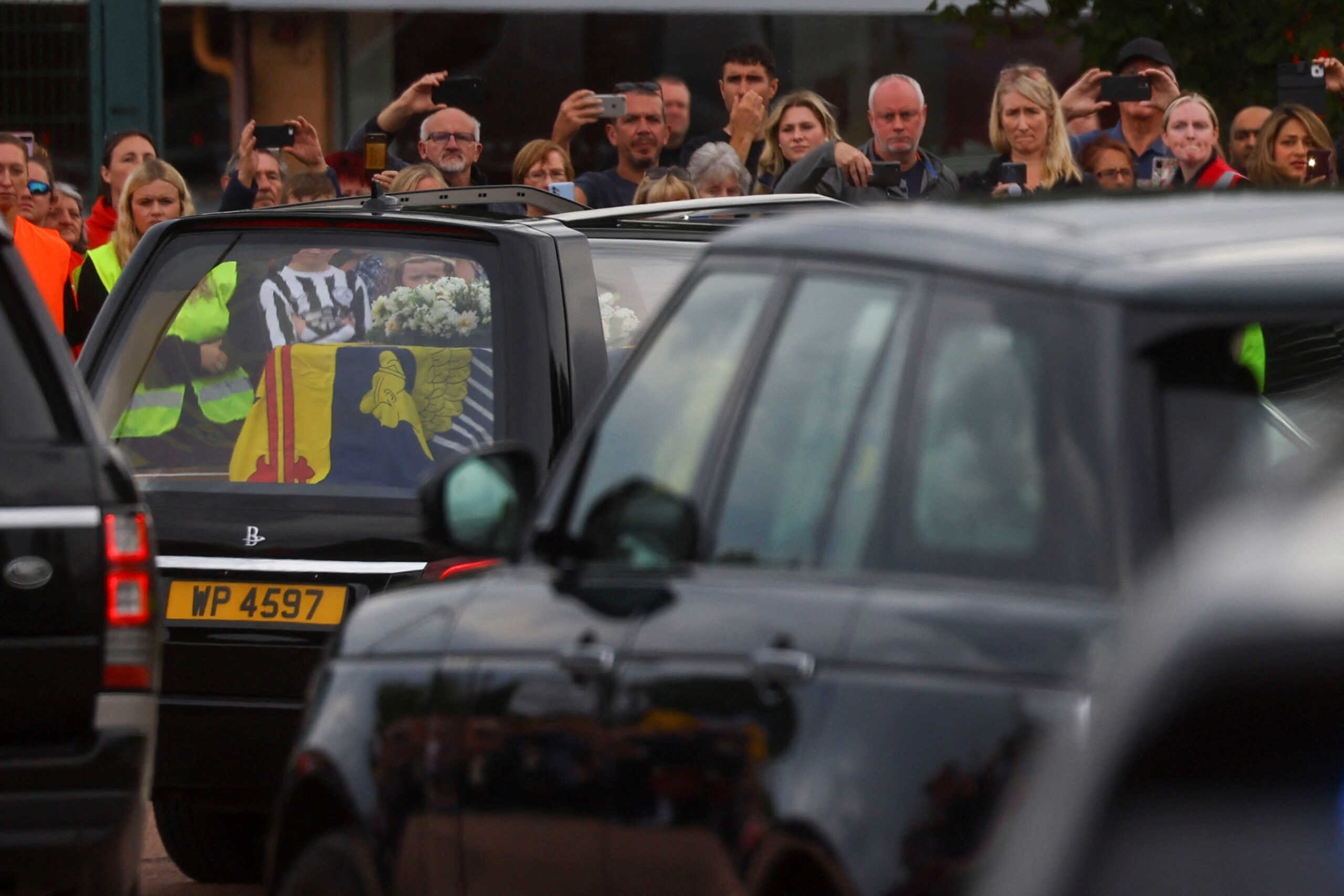 The hearse carrying the coffin of Britain's Queen Elizabeth passes near Dundee, Scotland, Britain, September 11, 2022. REUTERS