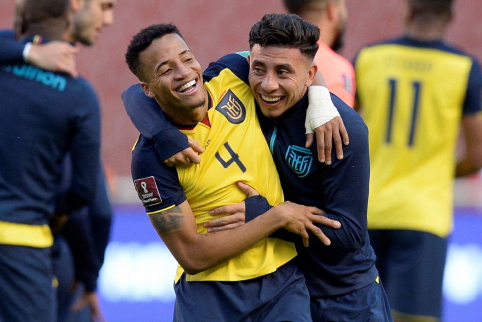 epa09444310 Ecuador's Byron Castillo (L) celebrates with his teammate Joao Rojas victory against Paraguay after the end of a match amid the Conmebol qualifiers for the Qatar 2022 World Cup, at the Rodrigo Paz Delgado Stadium in Quito, Ecuador, 02 September 2021.  EPA