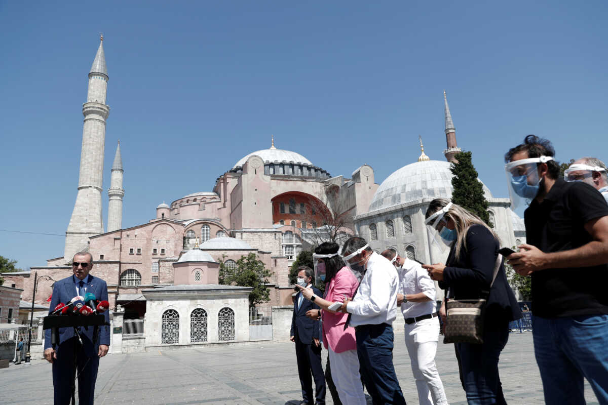 FILE PHOTO: Turkish President Tayyip Erdogan talks to media after attending Friday prayers at Hagia Sophia Grand Mosque in Istanbul, Turkey August 7, 2020.  To match Special Report TURKEY-ERDOGAN