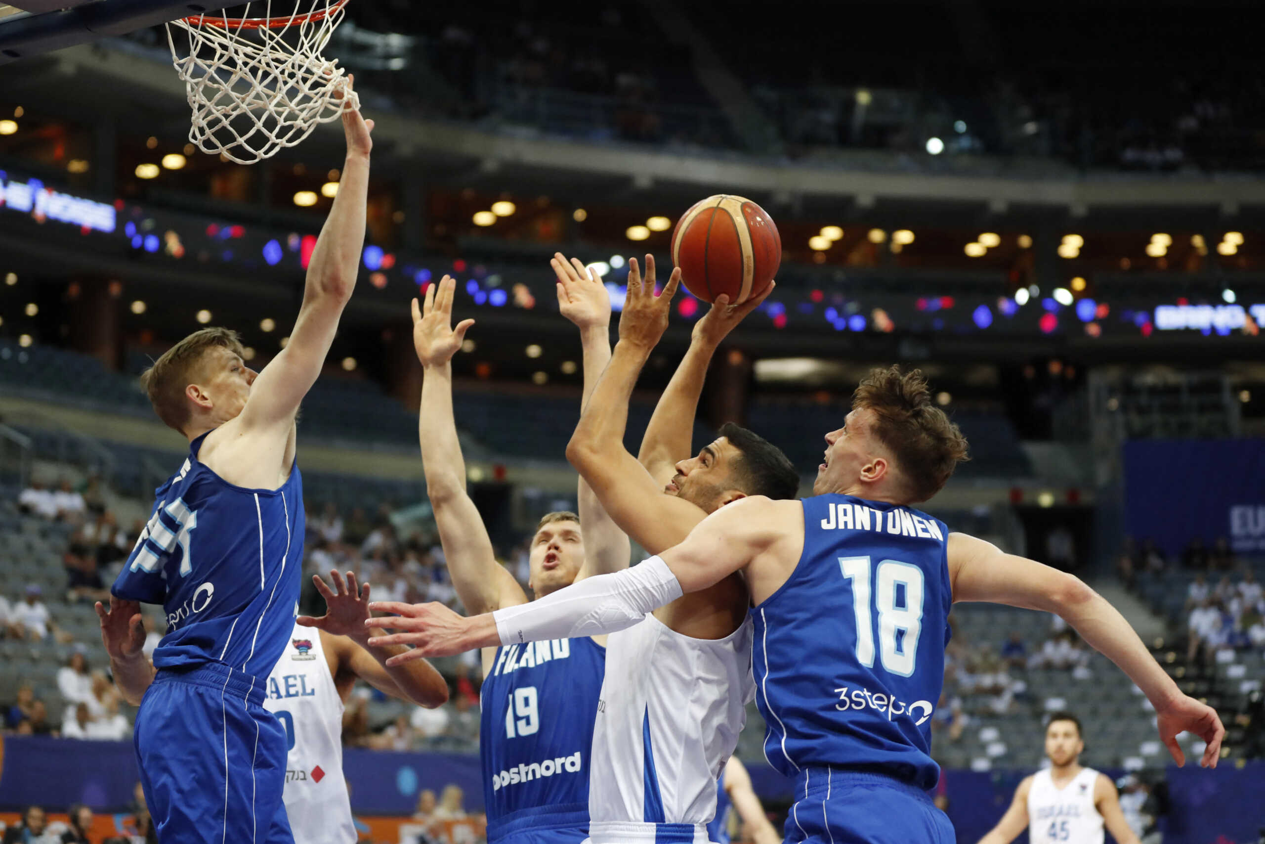 Basketball - EuroBasket Championship - Group D - Israel v Finland - Prague Arena, Prague, Czech Republic - September 2, 2022 Israel's Tomer Ginat in action with Finland's Mikael Jantunen and Henri Kantonen REUTERS