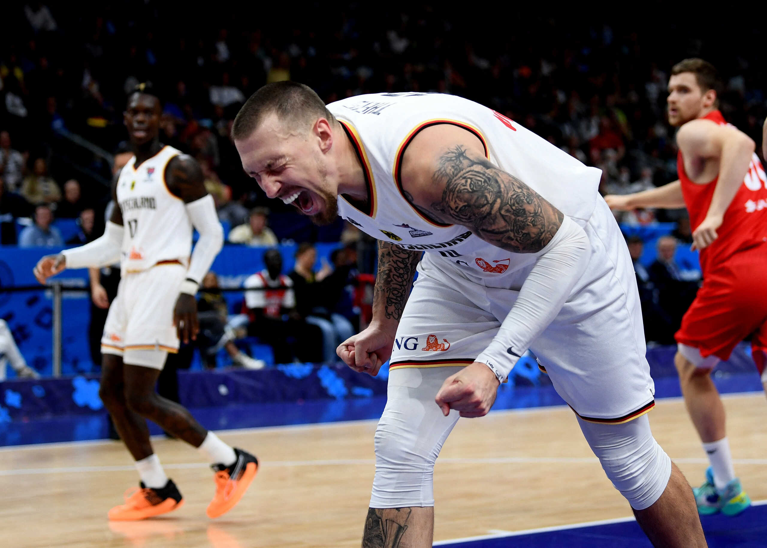 Basketball - EuroBasket Championship - Third Place Playoff - Germany v Poland - Mercedes-Benz Arena, Berlin, Germany - September 18, 2022  Germany's Daniel Theis reacts REUTERS