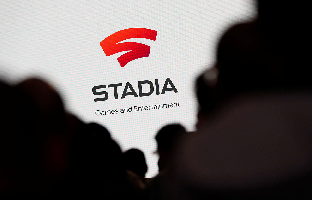 FILE PHOTO: Spectators look on during a Google keynote address announcing a new video gaming streaming service named Stadia that attempts to capitalize on the company's cloud technology and global network of data centers, at the Gaming Developers Conference in San Francisco, California, U.S., March 19, 2019. REUTERS