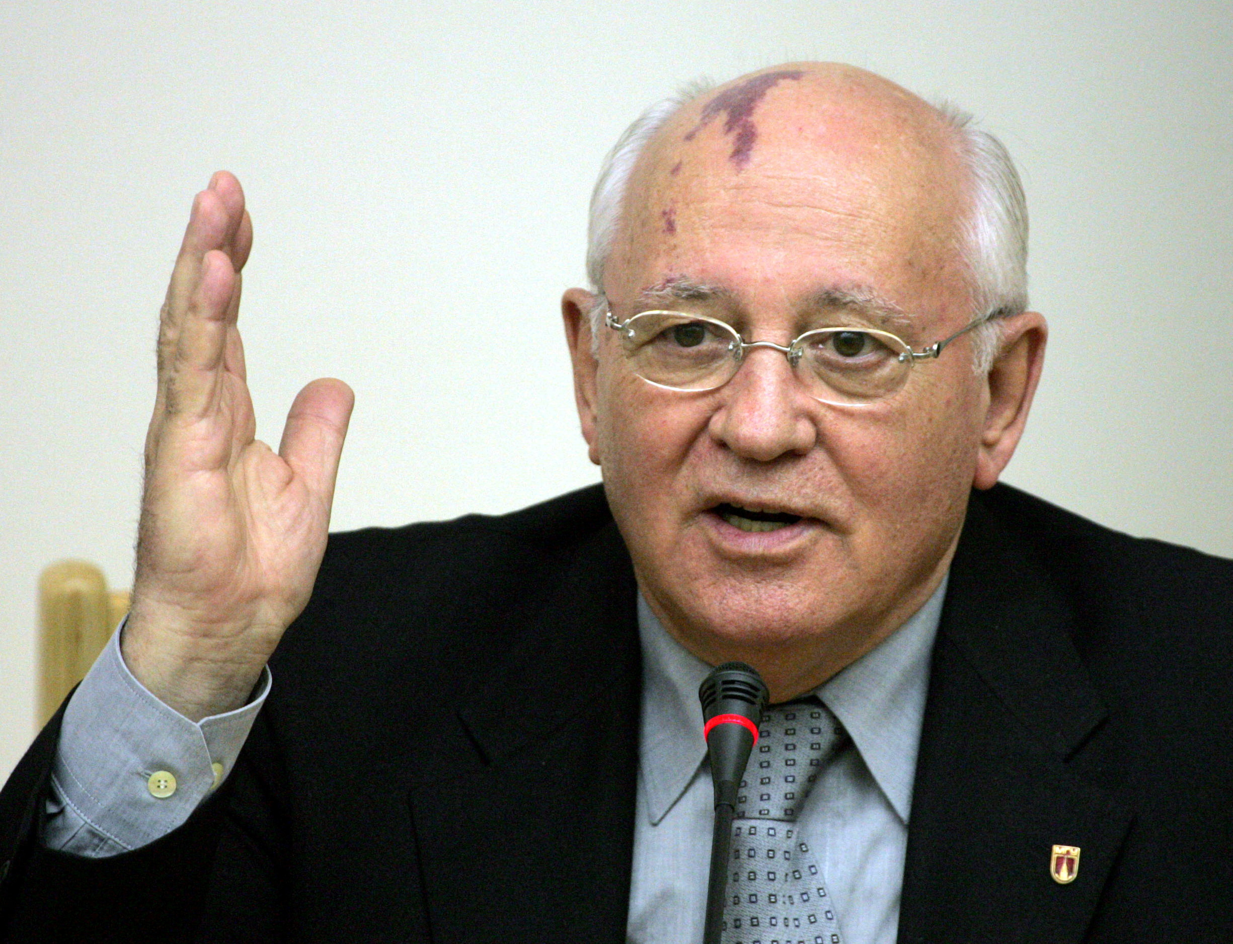 FILE PHOTO: Former Soviet Union President Mikhail Gorbachev speaks at a meeting with former U.S. President George Bush (not pictured) in Moscow State Institute of International Relations, in Moscow Russia May 23, 2005. REUTERS