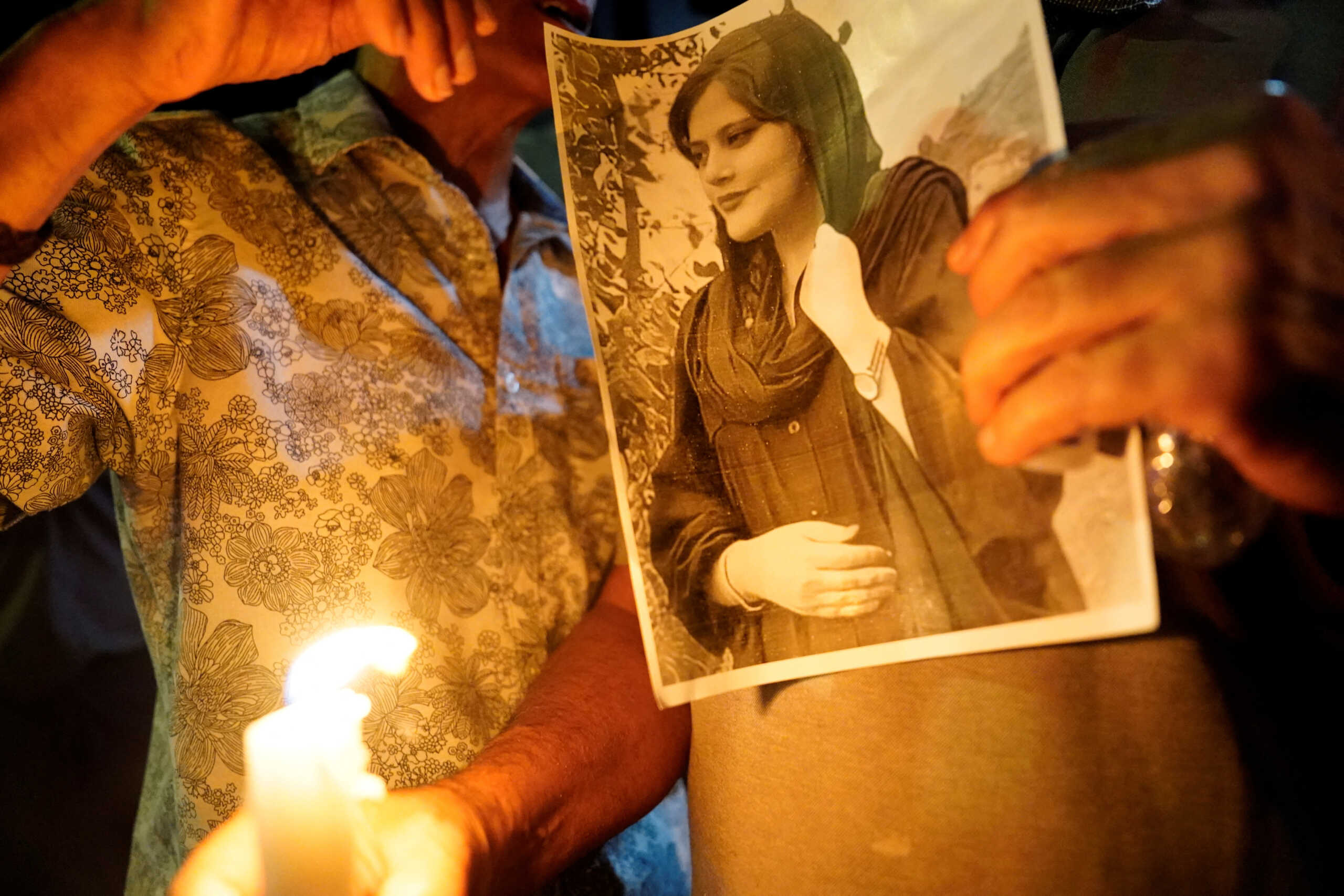 A image of Zhina Mahsa Amini at a candlelit vigil following her death, outside the Wilshire Federal Building in Los Angeles, California, U.S., September 22, 2022. REUTERS