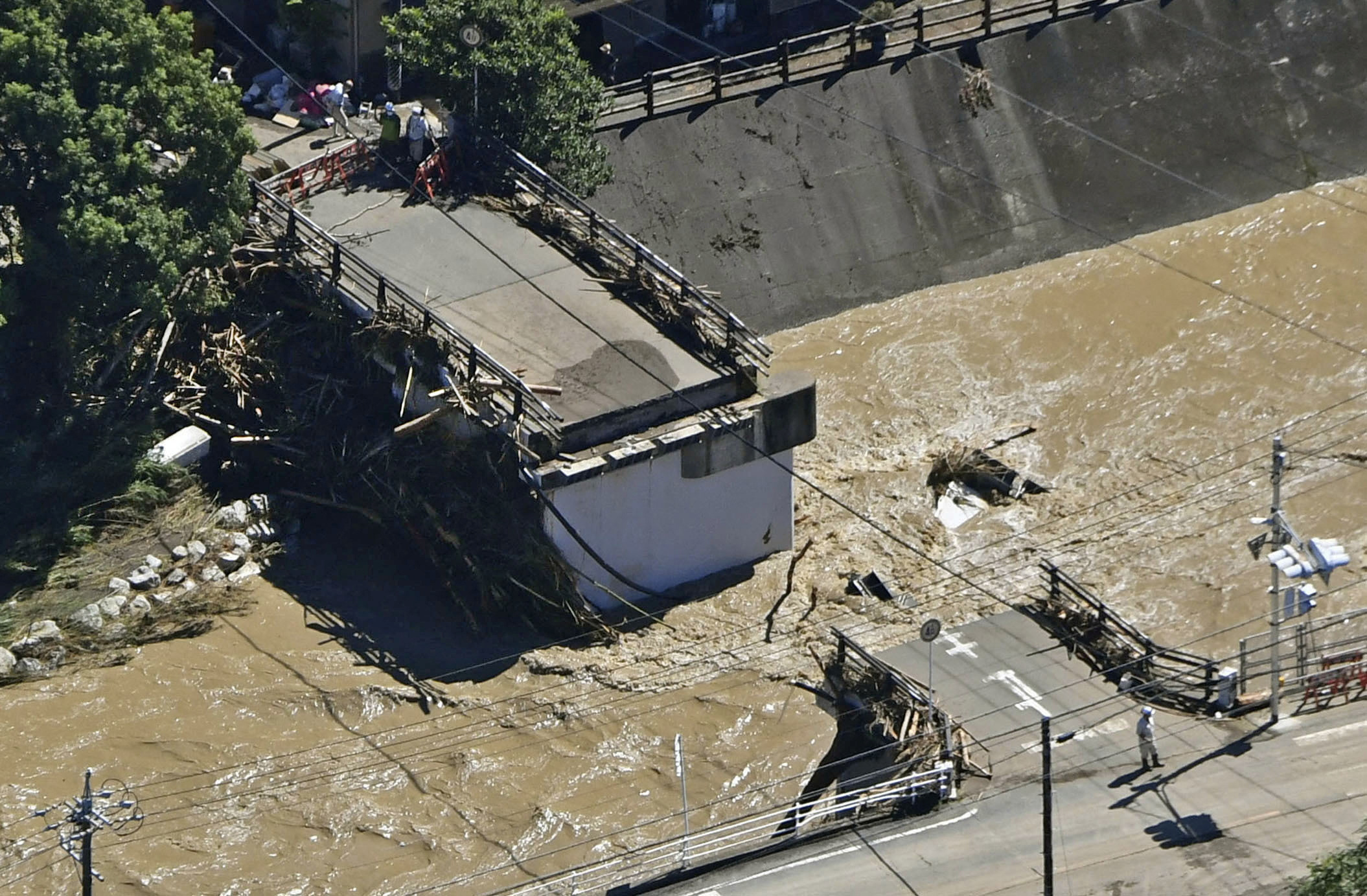 A damaged bridge by a typhoon is seen in Hamamatsu, Shizuoka Prefecture, Japan in this photo taken by Kyodo on September 24, 2022. Mandatory credit Kyodo