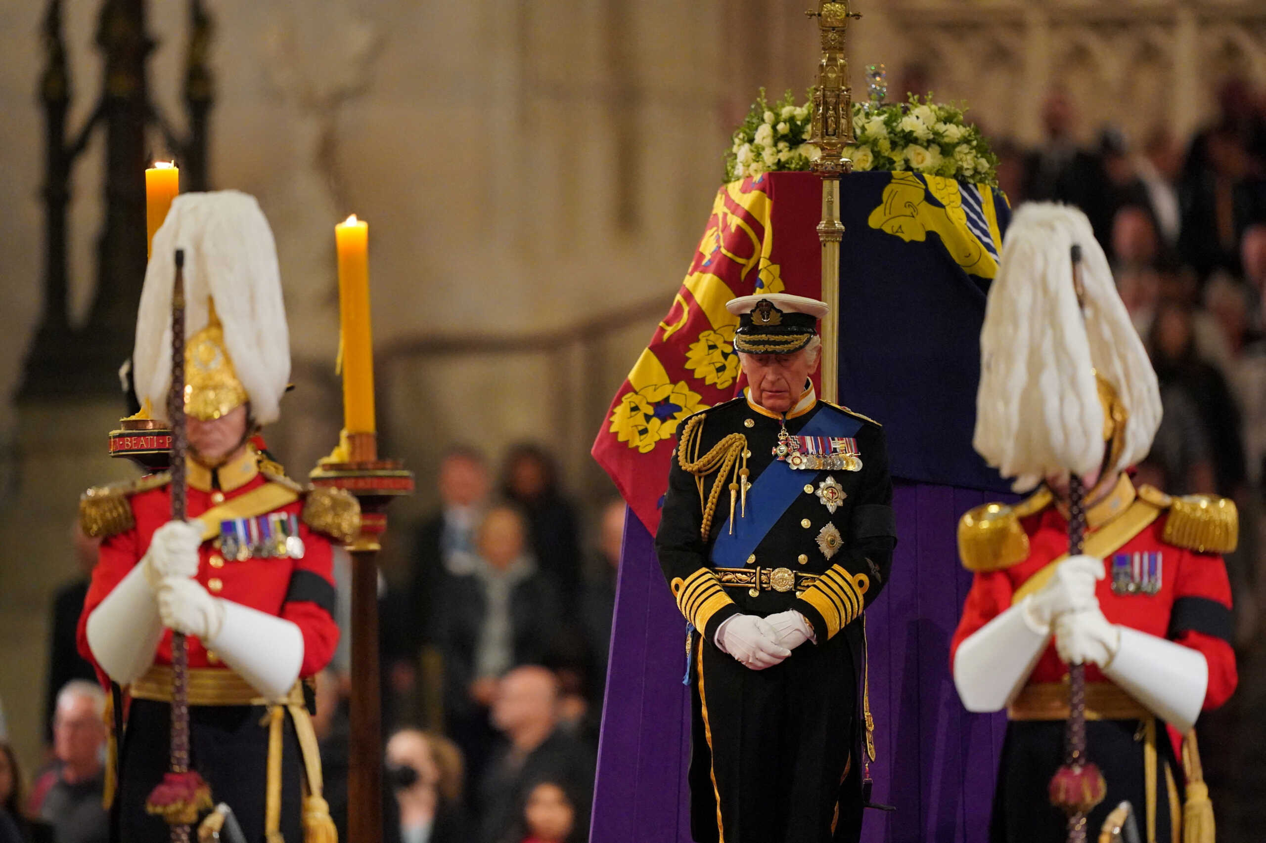 King Charles III stands vigil beside the coffin of his mother, Queen Elizabeth II, as it lies in state on the catafalque in Westminster Hall, at the Palace of Westminster, London. September 16, 2022. Dominic Lipinski