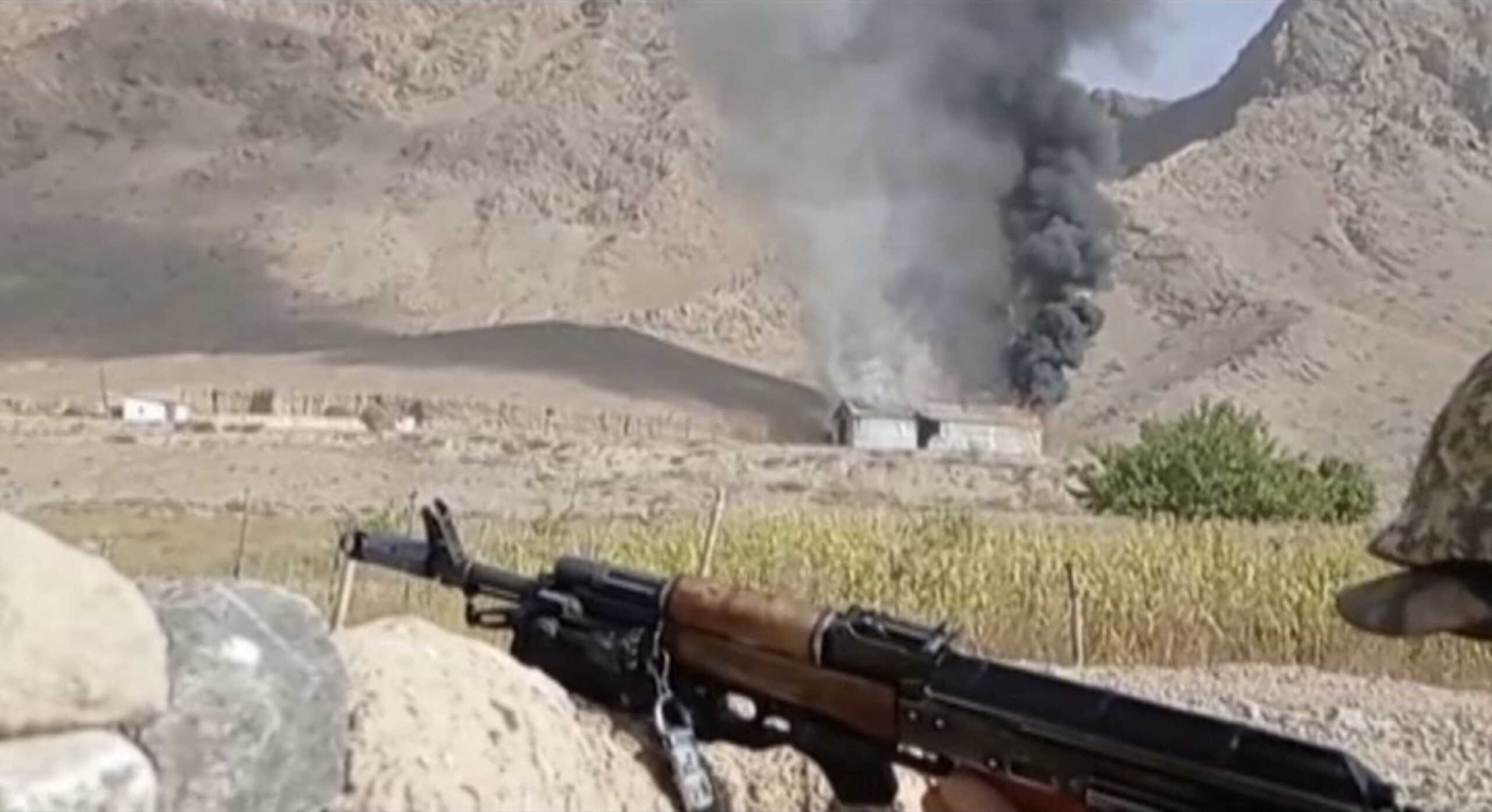 A still image from video, released by the Kyrgyz border guard service, shows what it said to be active military confrontation on Kyrgyz-Tajik border as seen from an unidentified location in the Batken region, Kyrgyzstan, in this still image taken from handout footage released September 16, 2022. Kyrgyz Border Guard Service