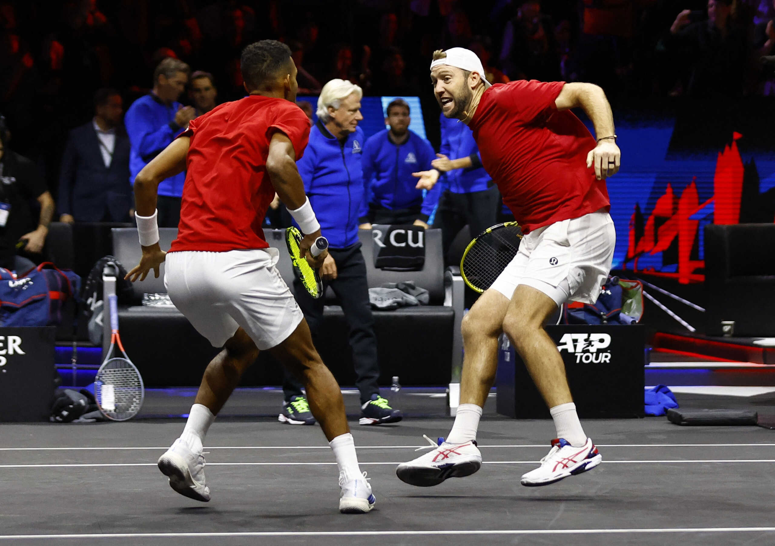 Tennis - Laver Cup - 02 Arena, London, Britain - September 25, 2022 Team World's Jack Sock and Felix Auger-Aliassime celebrate winning their doubles match against Team Europe's Matteo Berrettini and Andy Murray Action Images via Reuters