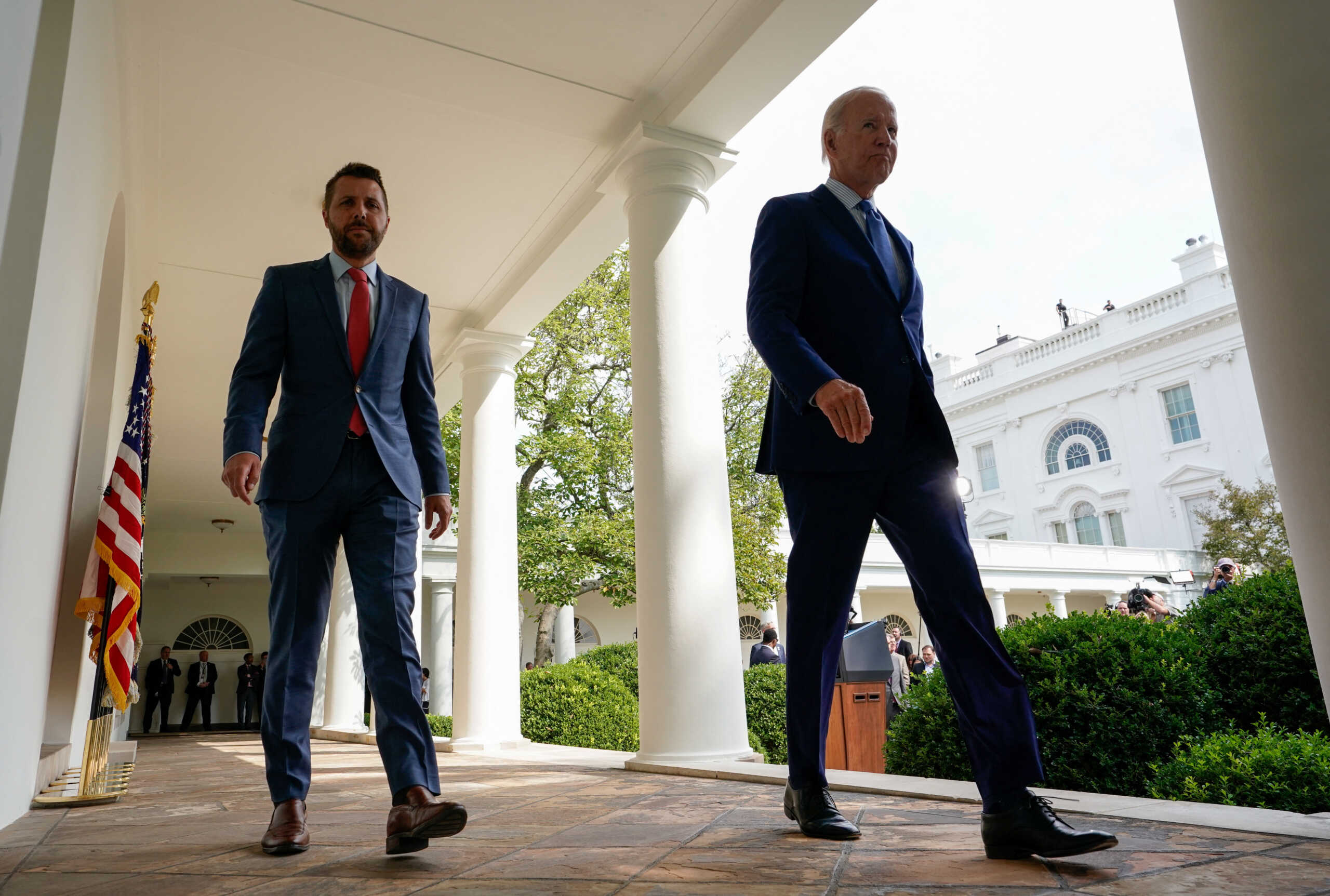 U.S. President Joe Biden and head of the White House National Economic Council Brian Deese walk back to the Oval office after Biden spoke on the tentative deal that U.S. railroads and unions secured to avert a rail shutdown, at the White House in Washington, U.S., September 15, 2022. REUTERS