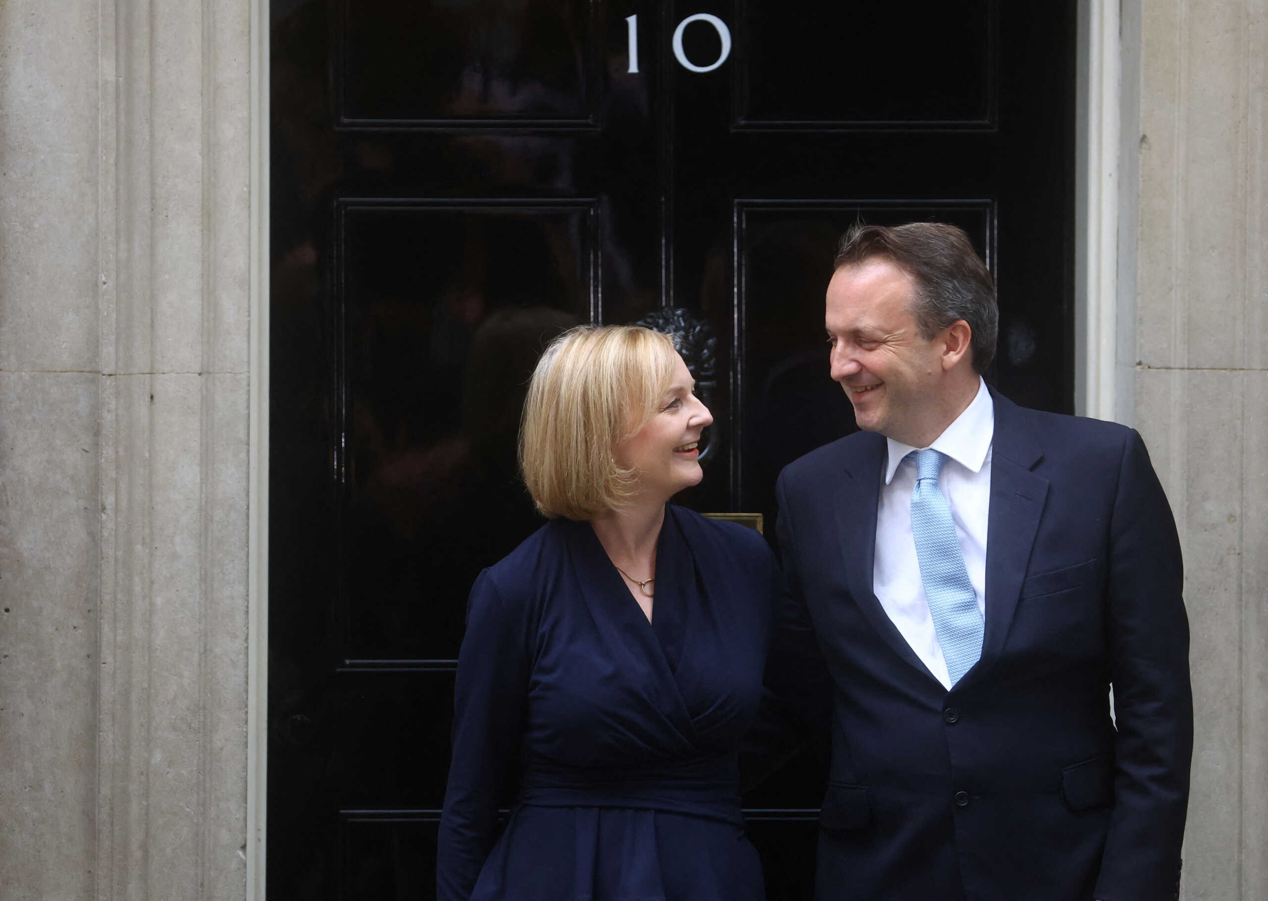 New British Prime Minister Liz Truss and her husband Hugh O'Leary pose outside Number 10 Downing Street, in London, Britain September 6, 2022. REUTERS