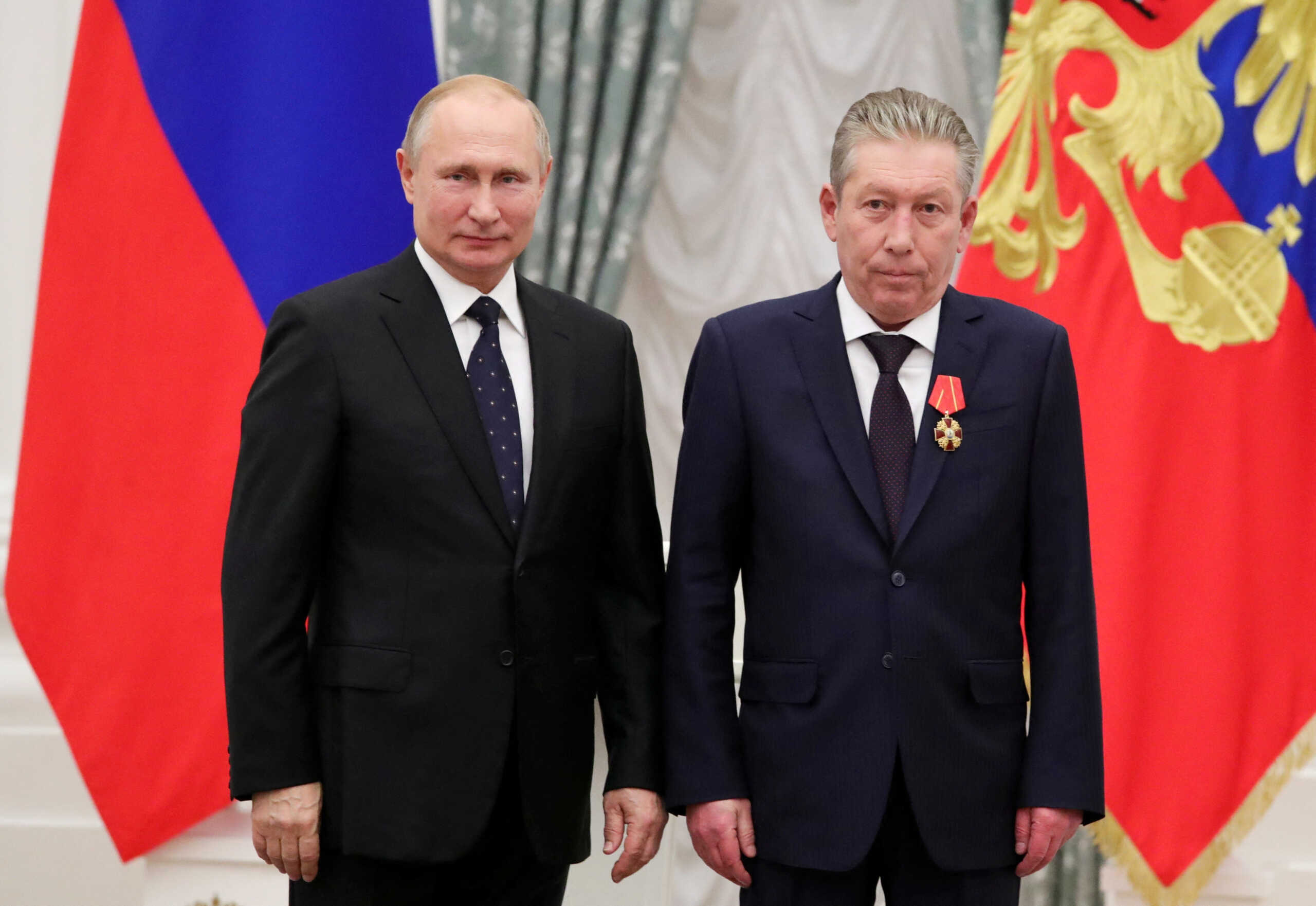 Russian President Vladimir Putin stands next to First Executive Vice President of oil producer Lukoil Ravil Maganov after decorating him with the Order of Alexander Nevsky during an awarding ceremony at the Kremlin in Moscow, Russia, November 21, 2019. Sputnik