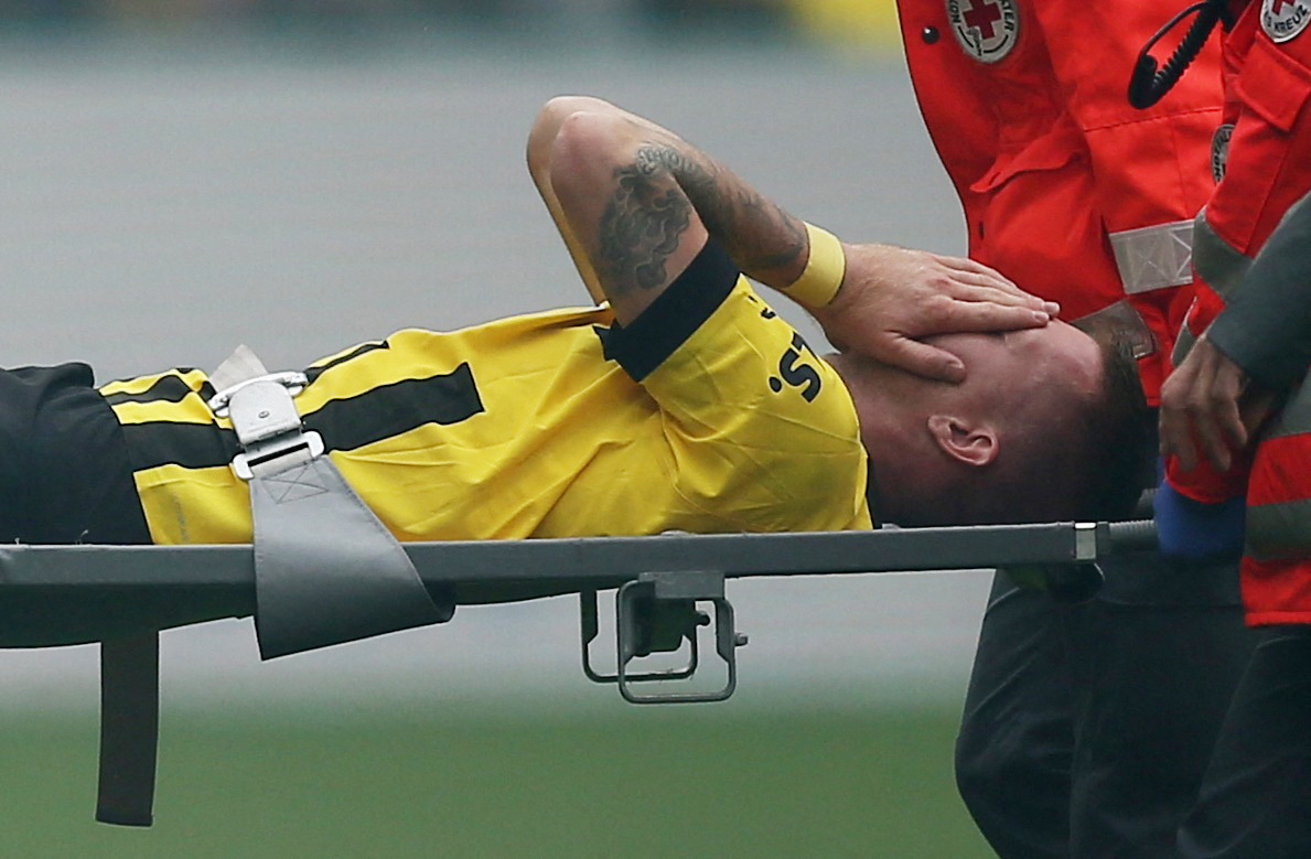 Soccer Football - Bundesliga - Borussia Dortmund v Schalke 04 - Signal Iduna Park, Dortmund, Germany - September 17, 2022  Borussia Dortmund's Marco Reus is carried away in a stretcher after sustaining an injury REUTERS