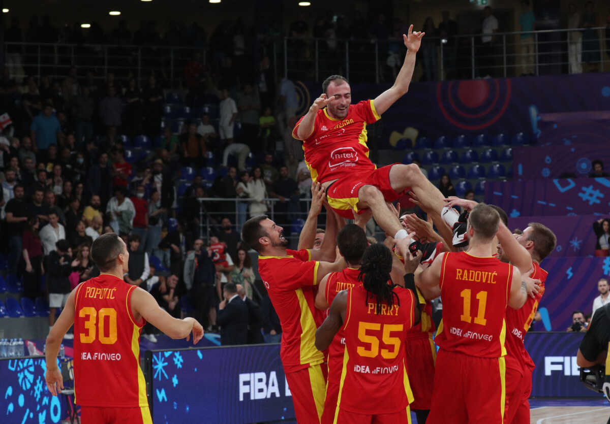 Basketball - EuroBasket Championship - Group A - Georgia v Montenegro - Tbilisi Arena, Tbilisi, Georgia - September 7, 2022 Montenegro players celebrate after the match REUTERS