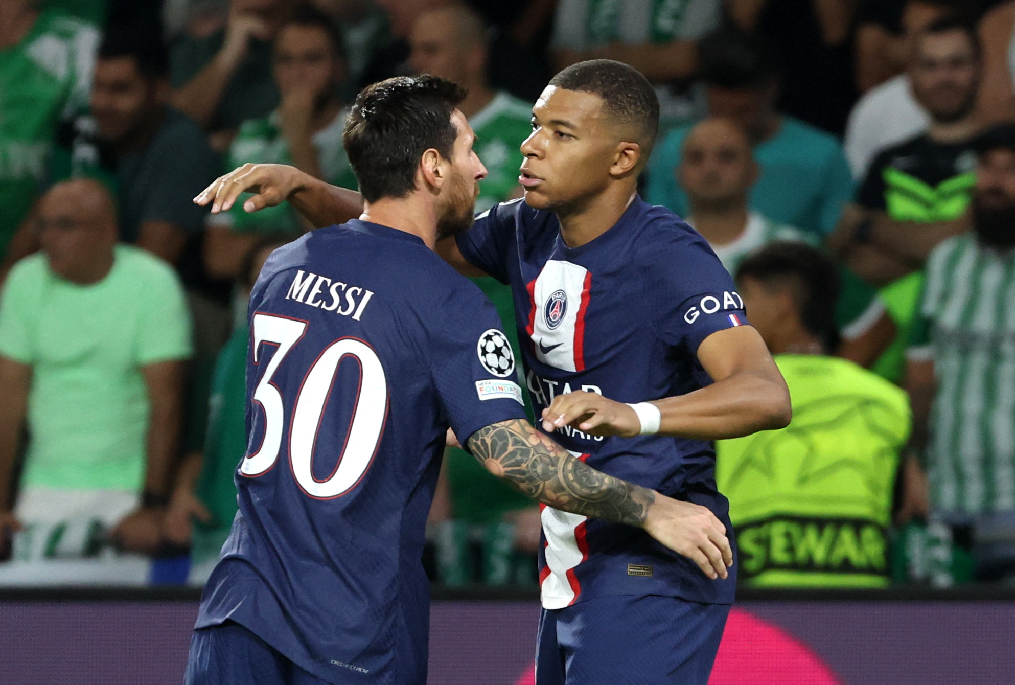 Soccer Football - Champions League - Group H - Maccabi Haifa v Paris St Germain - Sammy Ofer Stadium, Haifa, Israel - September 14, 2022  Paris St Germain's Kylian Mbappe celebrates scoring their second goal with Lionel Messi REUTERS