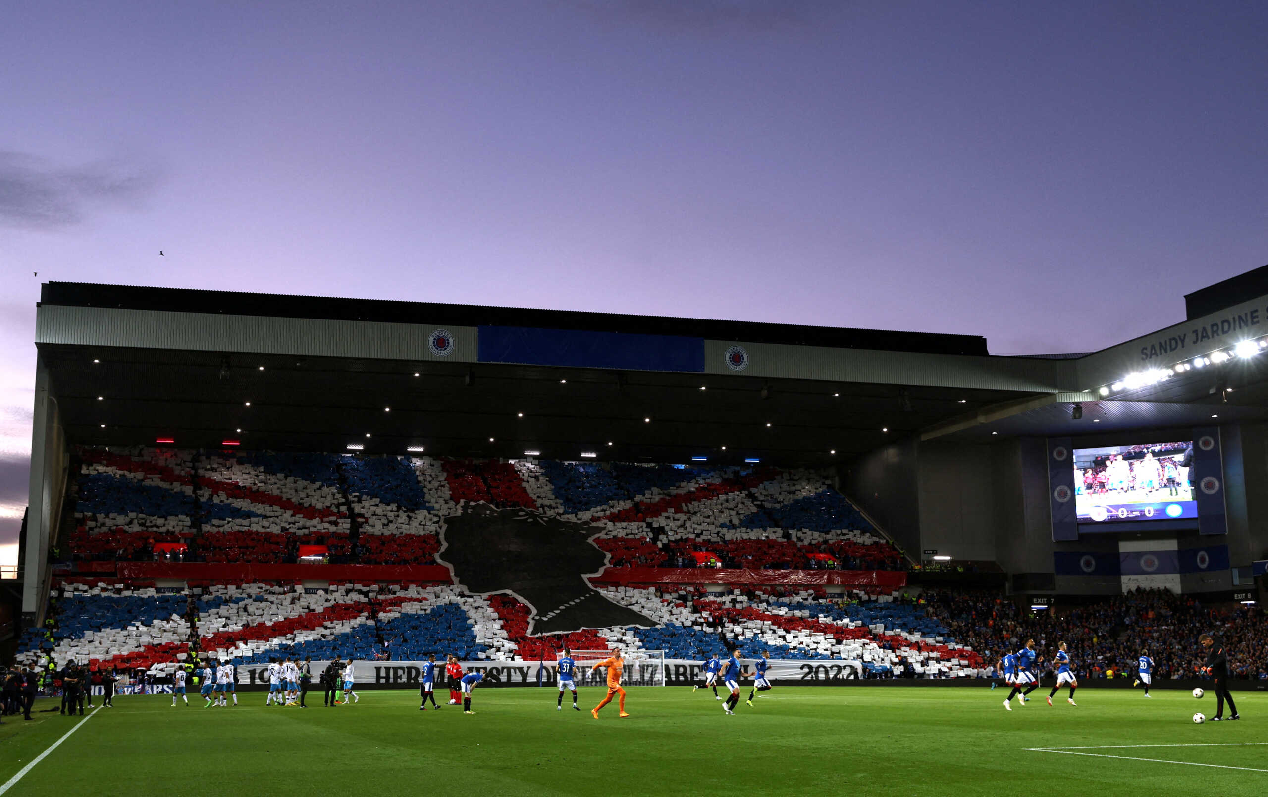 Soccer Football - Champions League - Group A - Rangers v Napoli - Ibrox, Glasgow, Scotland, Britain - September 14, 2022 Fans display the Union flag in the stand before the match following the death of Britain's Queen Elizabeth Action Images via Reuters