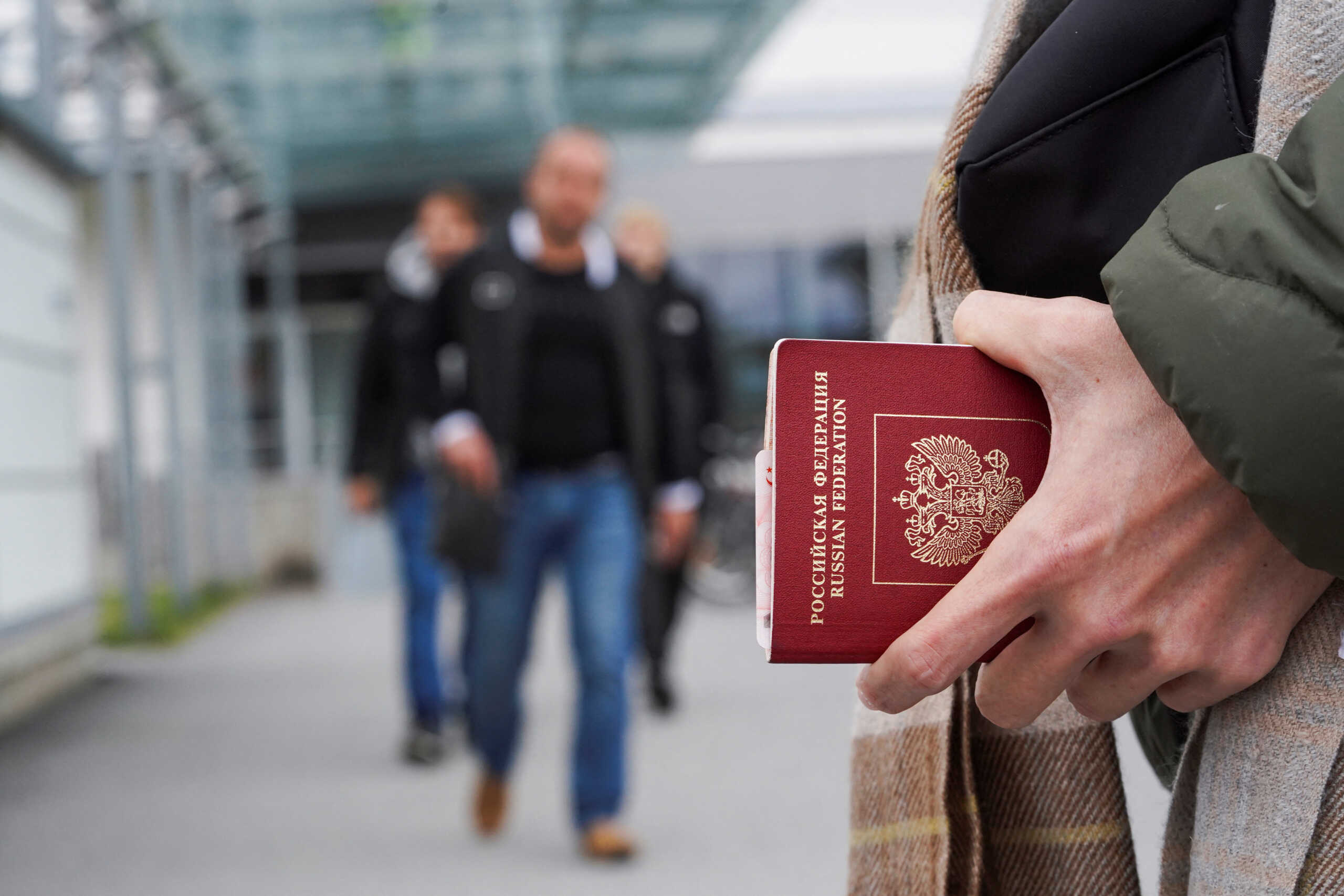 A person holds a Russian Passport at Vaalimaa border crossing point between Russia and Finland, in Vaalimaa, Finland, September 23, 2022. REUTERS