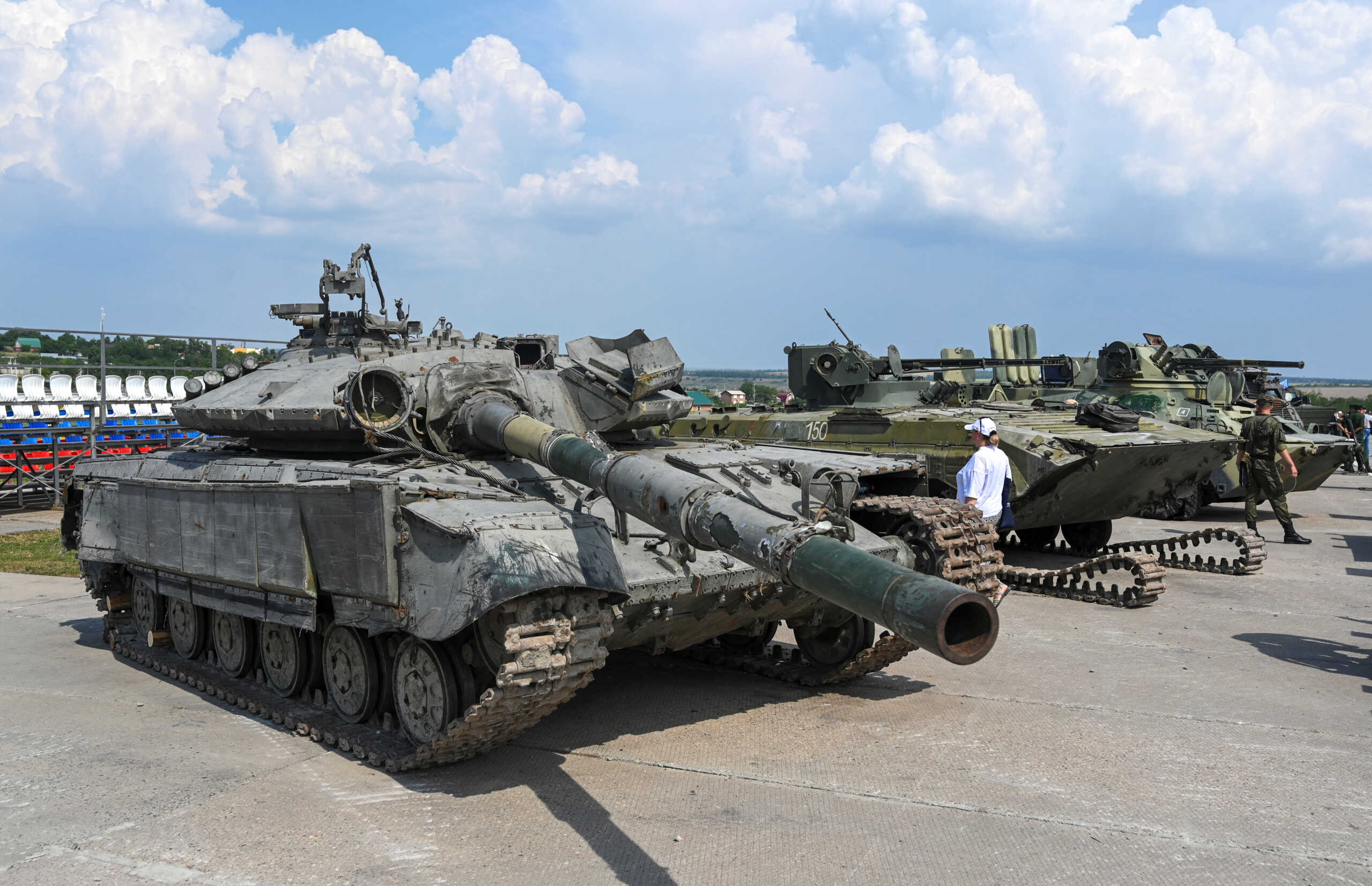 People visit the exhibition of weaponry and equipment, which according to the Russian defence ministry were captured during a military conflict in Ukraine, at the international military-technical forum Army-2022 in the Rostov region, Russia August 19, 2022. REUTERS