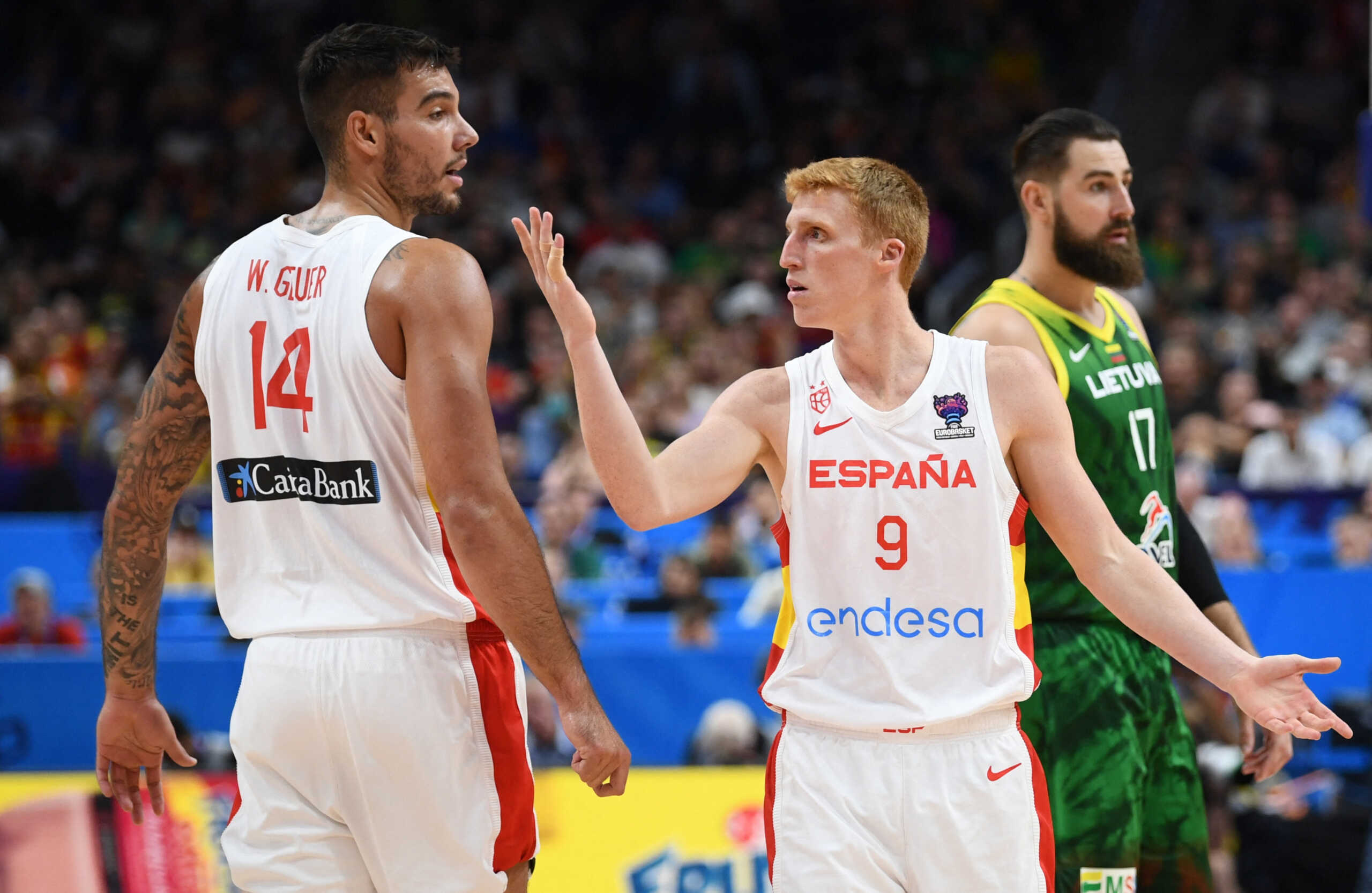 Basketball - EuroBasket Championship - Round of 16 - Spain v Lithuania - Mercedes-Benz Arena, Berlin, Germany - September 10, 2022 Spain's Alberto Diaz reacts as Willy Hernangomez looks on REUTERS
