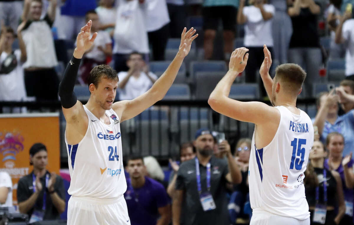 Basketball - EuroBasket Championship - Group D - Czech Republic v Netherlands - Prague Arena, Prague, Czech Republic - September 5, 2022 Czech Republic's Jan Vesely and Martin Peterka celebrate after the match REUTERS