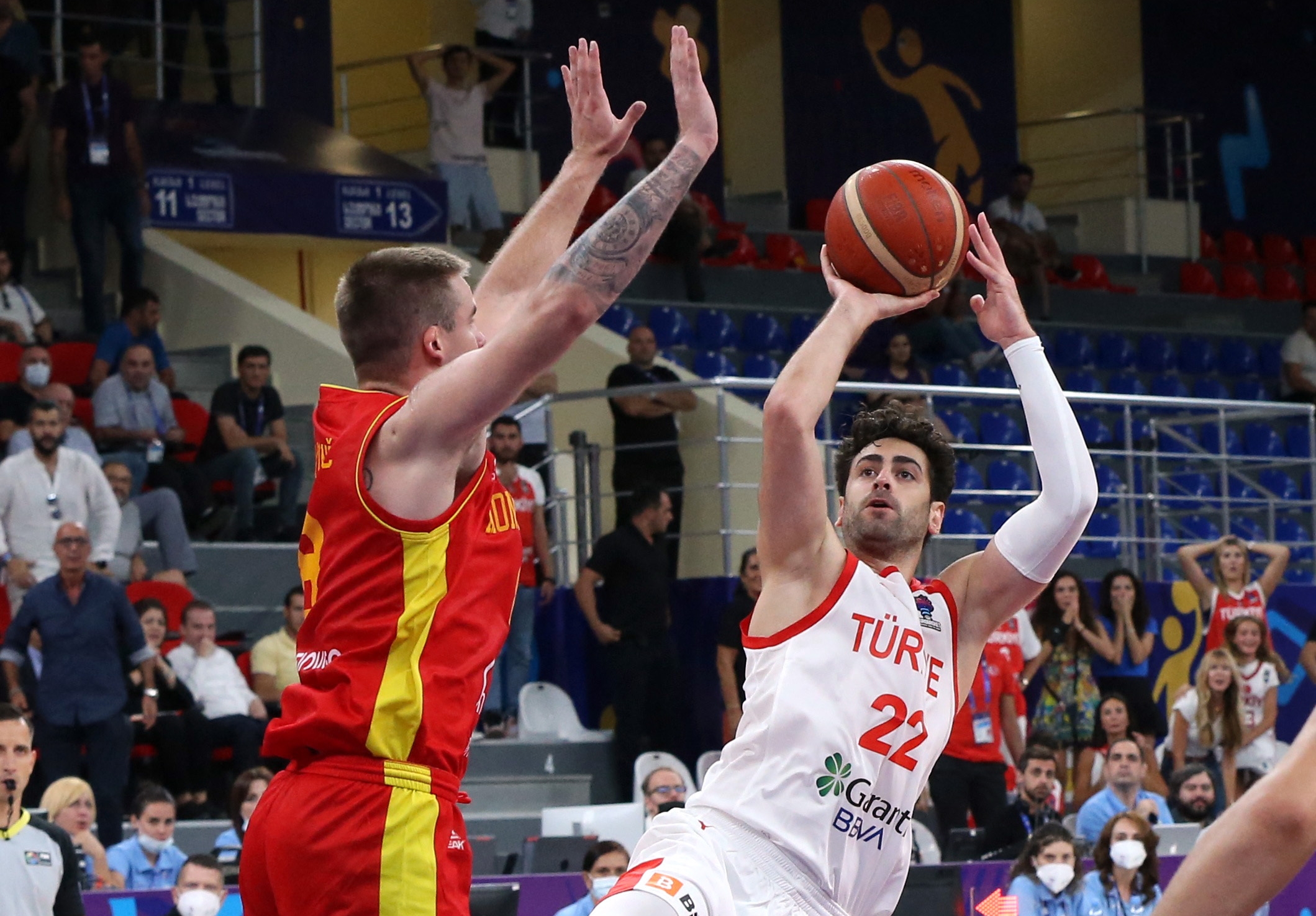 Basketball - EuroBasket Championship - Group A - Turkey v Montenegro - Tbilisi Arena, Tbilisi, Georgia - September 1, 2022 Turkey's Furkan Korkmaz in action with Montenegro's Marko Simonovic REUTERS