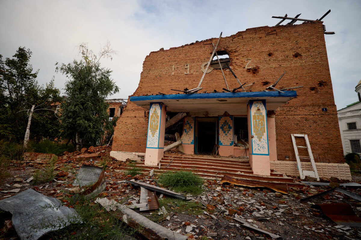 A view shows a building damaged by military strike in the town of Izium, recently liberated by the Ukrainian Armed Forces, amid Russia's attack on Ukraine, in Kharkiv region, Ukraine September 13, 2022.  Ukrainian Presidential Press Service