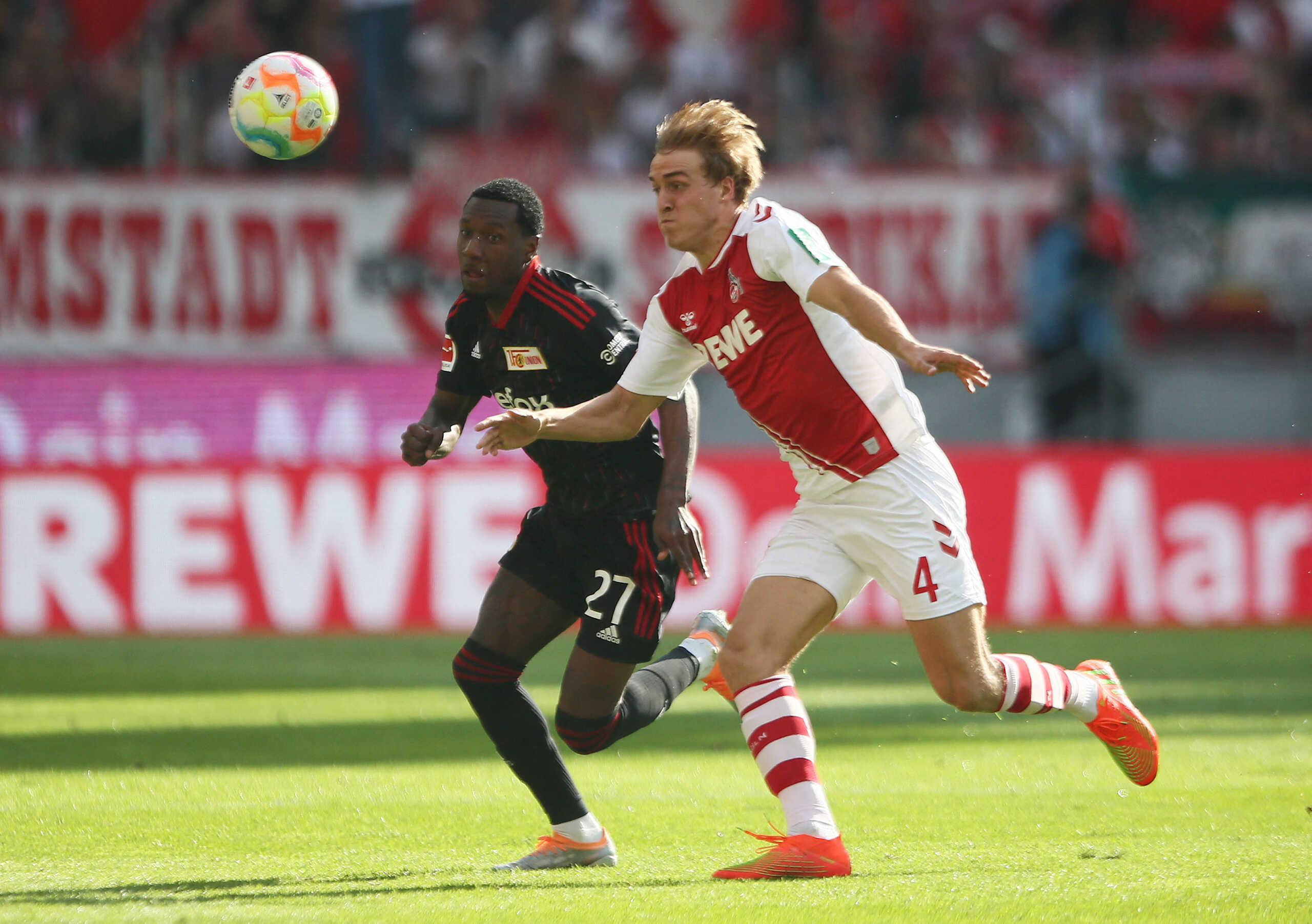 Soccer Football - Bundesliga - FC Cologne v 1. FC Union Berlin - RheinEnergieStadion, Cologne, Germany - September 11, 2022 1. FC Union Berlin's Sheraldo Becker in action with FC Cologne's Timo Hubers REUTERS