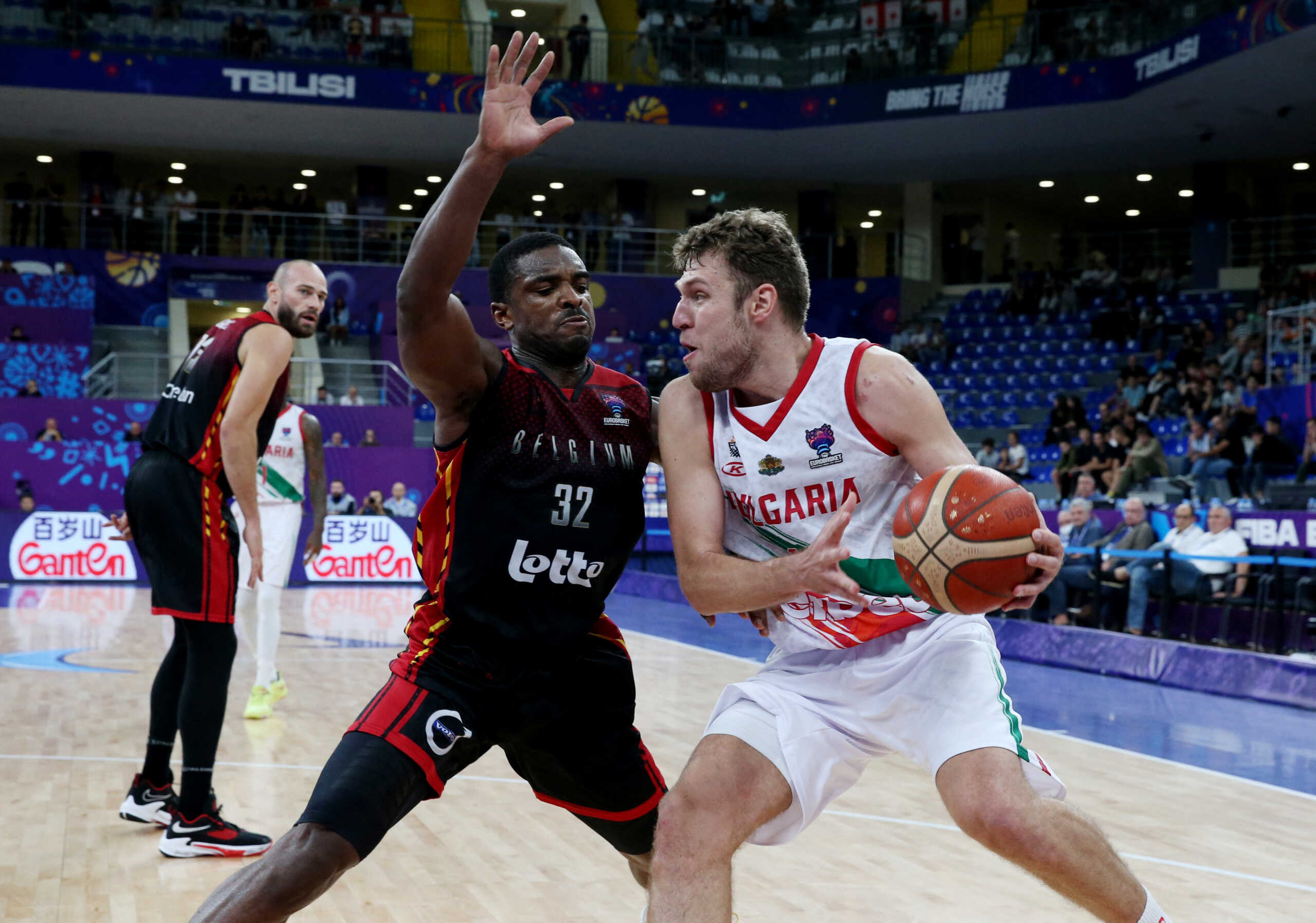 Basketball - EuroBasket Championship - Group A - Bulgaria v Belgium - Tbilisi Arena, Tbilisi, Georgia - September 7, 2022 Bulgaria's Aleksandar Vezenkov in action with Belgium's Retin Obasohan REUTERS