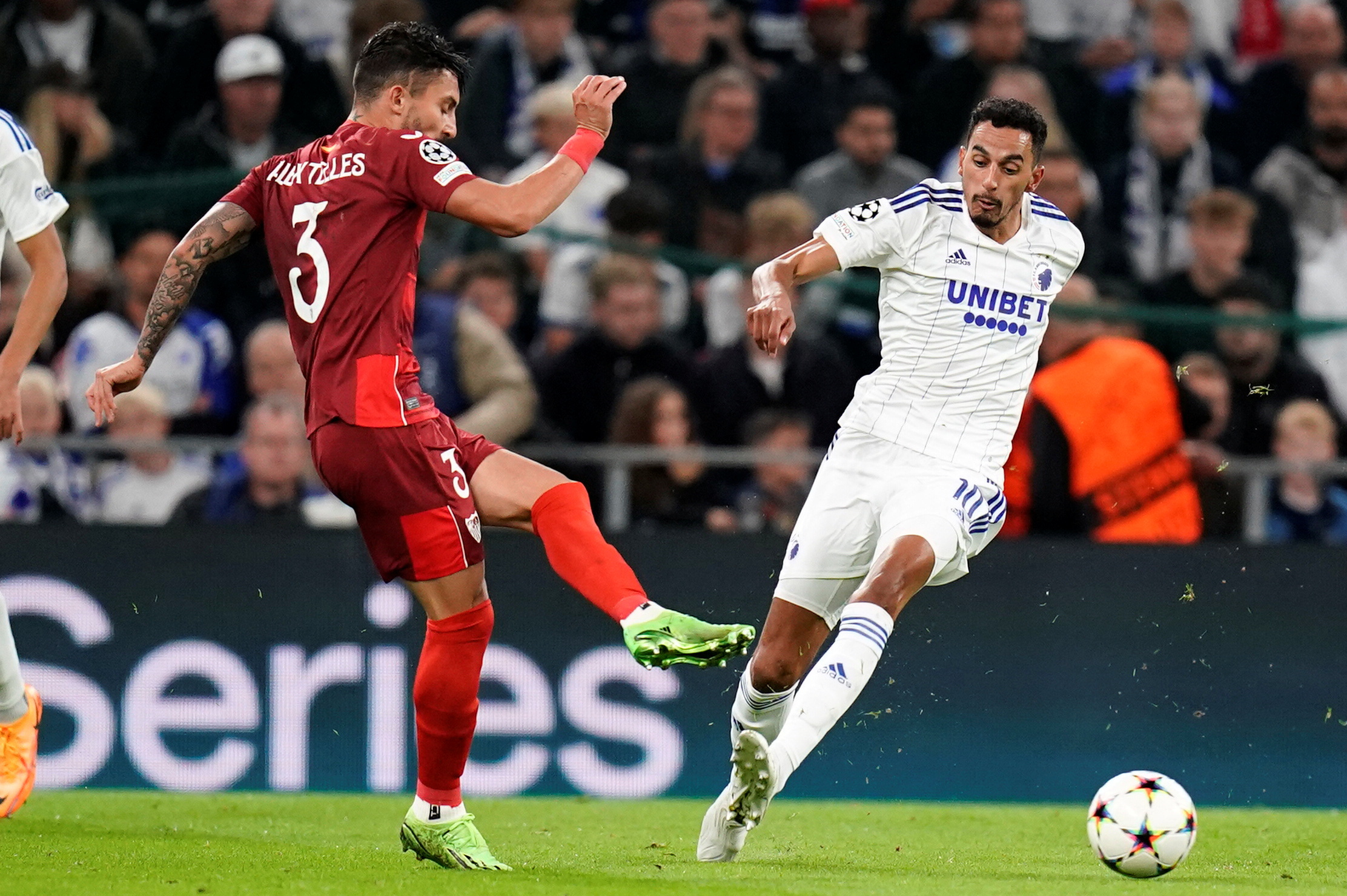 Soccer Football - Champions League - Group G - FC Copenhagen v Sevilla - Parken, Copenhagen, Denmark - September 14, 2022 FC Copenhagen's Jose Zeca in action with Sevilla's Alex Telles   Liselotte Sabroe
