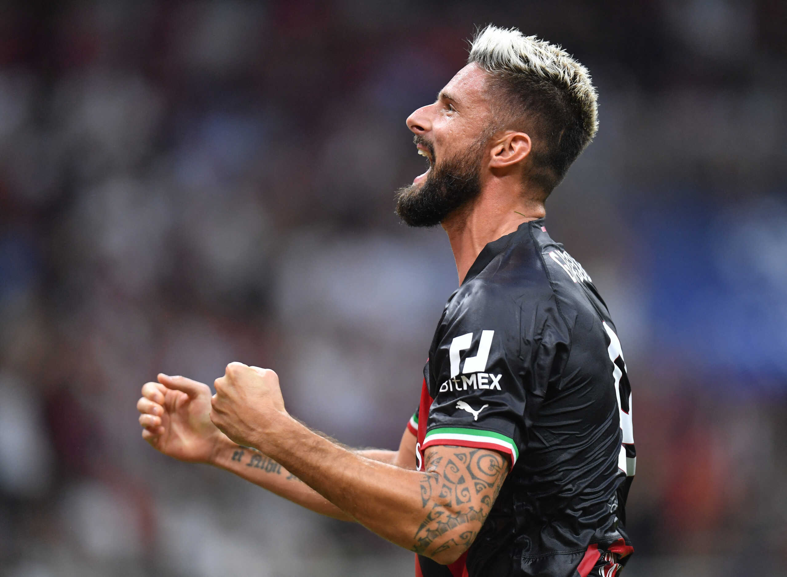 Soccer Football - Champions League - Group E - AC Milan v Dinamo Zagreb - San Siro, Milan, Italy - September 14, 2022 AC Milan's Olivier Giroud celebrates scoring their first goal REUTERS