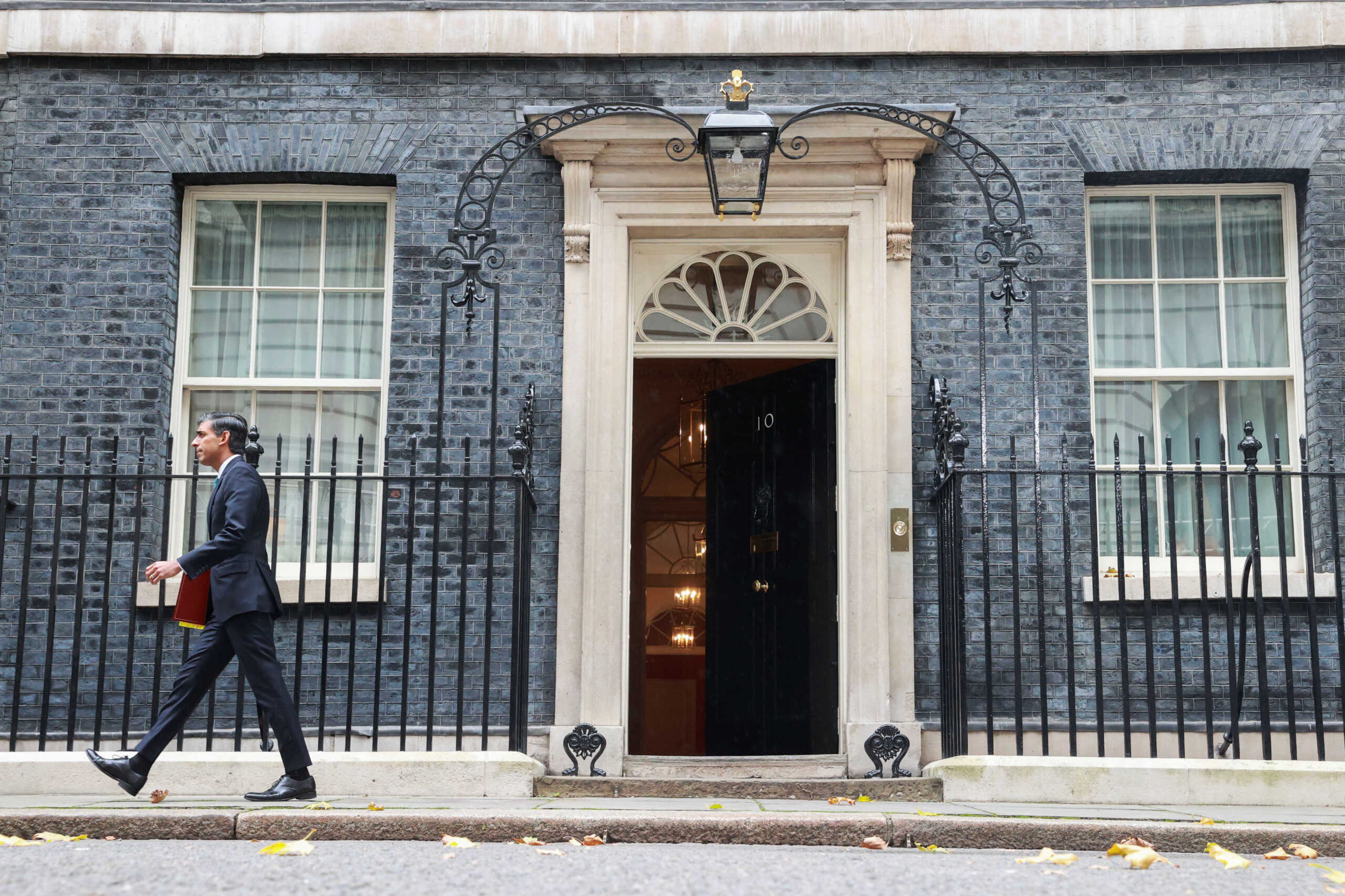 Britain's Prime Minister Rishi Sunak walks outside Number 10 Downing Street, in London, Britain, October 26, 2022. REUTERS