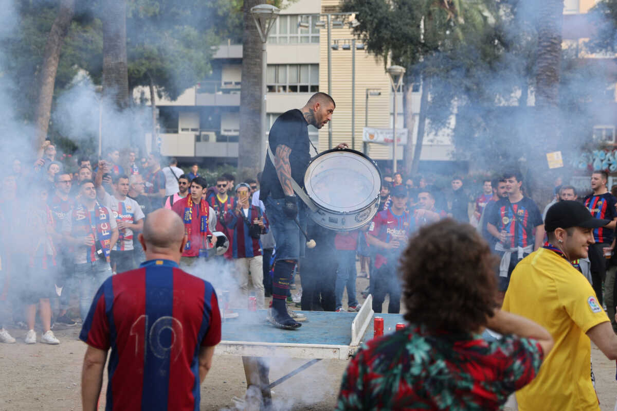 Soccer Football - Champions League - Group C - FC Barcelona v Inter Milan - Camp Nou, Barcelona, Spain - October 12, 2022  A FC Barcelona fan plays a drum outside the stadium before the match REUTERS