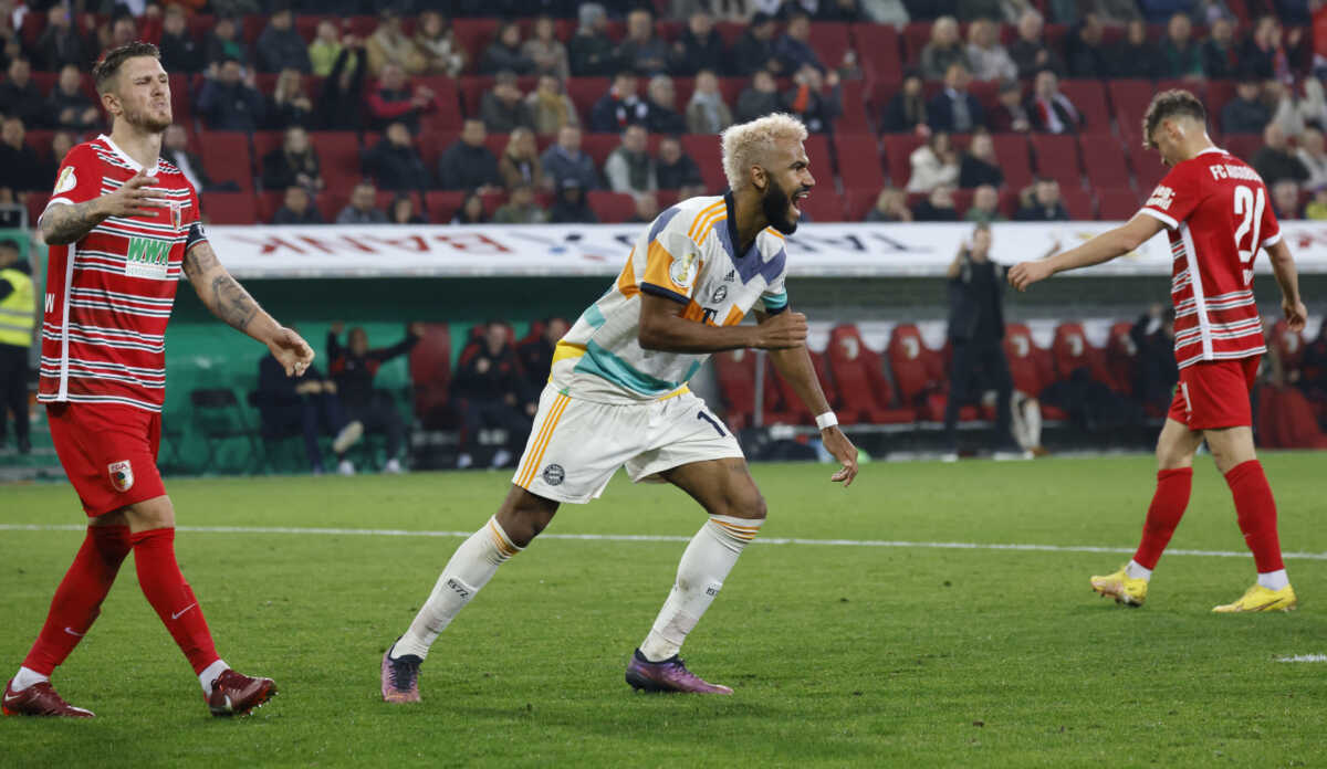 Soccer Football - DFB Cup - Second Round - FC Augsburg v Bayern Munich - WWK Arena, Augsburg, Germany - October 19, 2022 Bayern Munich's Eric Maxim Choupo-Moting celebrates their fourth goal scored by Jamal Musiala REUTERS