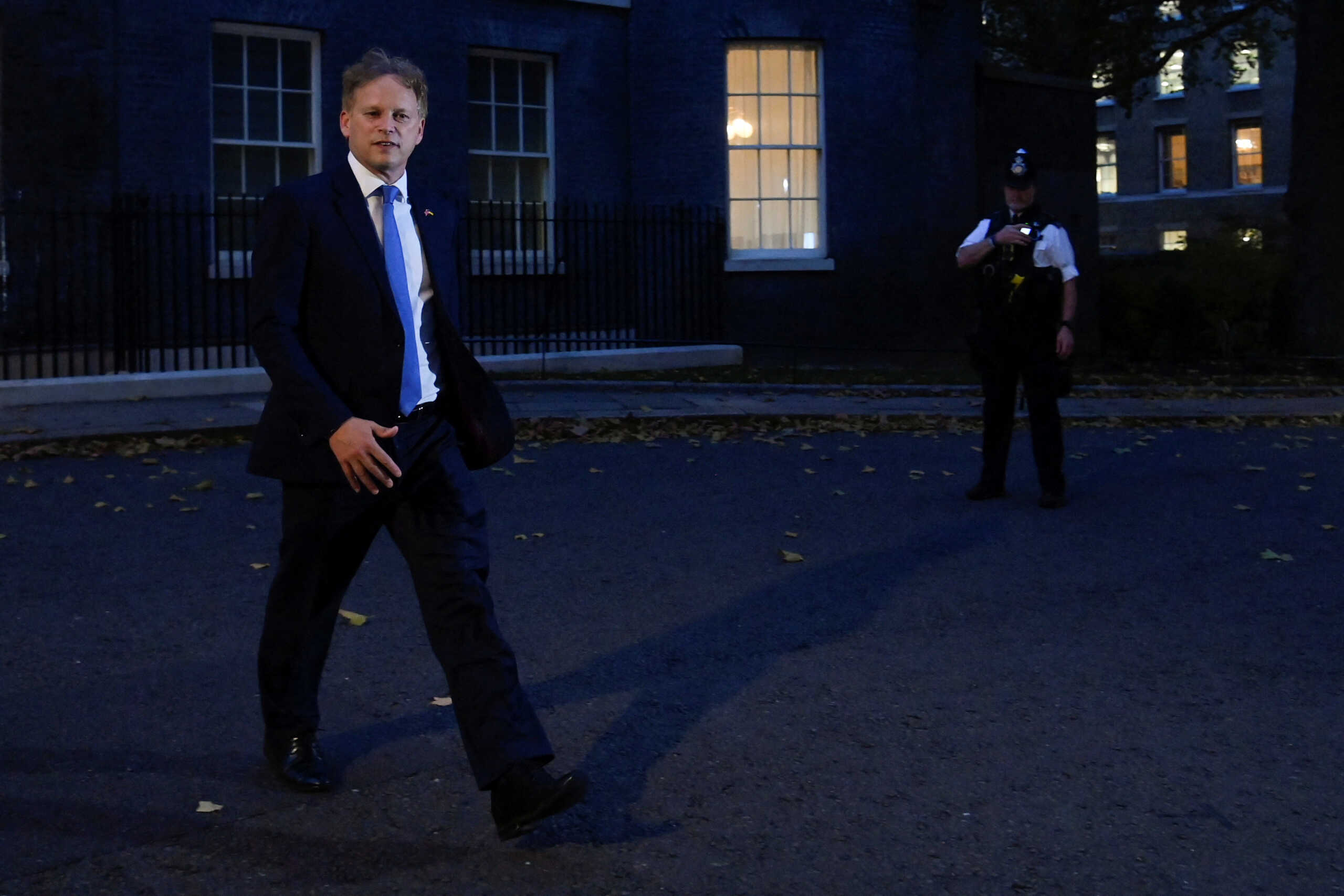 British Secretary of State for the Home Department Grant Shapps walks outside Number 10 Downing Street, in London, Britain, October 19, 2022. REUTERS
