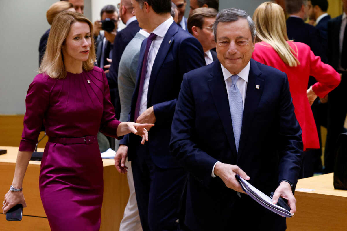 Estonia's Prime Minister Kaja Kallas and Italy's Prime Minister Mario Draghi attend the European Union leaders' summit in Brussels, Belgium, October 20, 2022. REUTERS