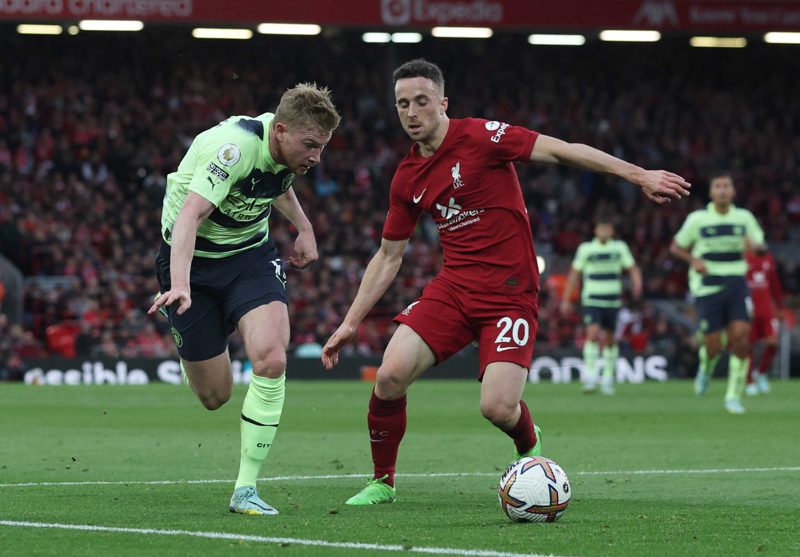 Soccer Football - Premier League - Liverpool v Manchester City - Anfield, Liverpool, Britain - October 16, 2022 Liverpool's Diogo Jota in action with Manchester City's Kevin De Bruyne REUTERS