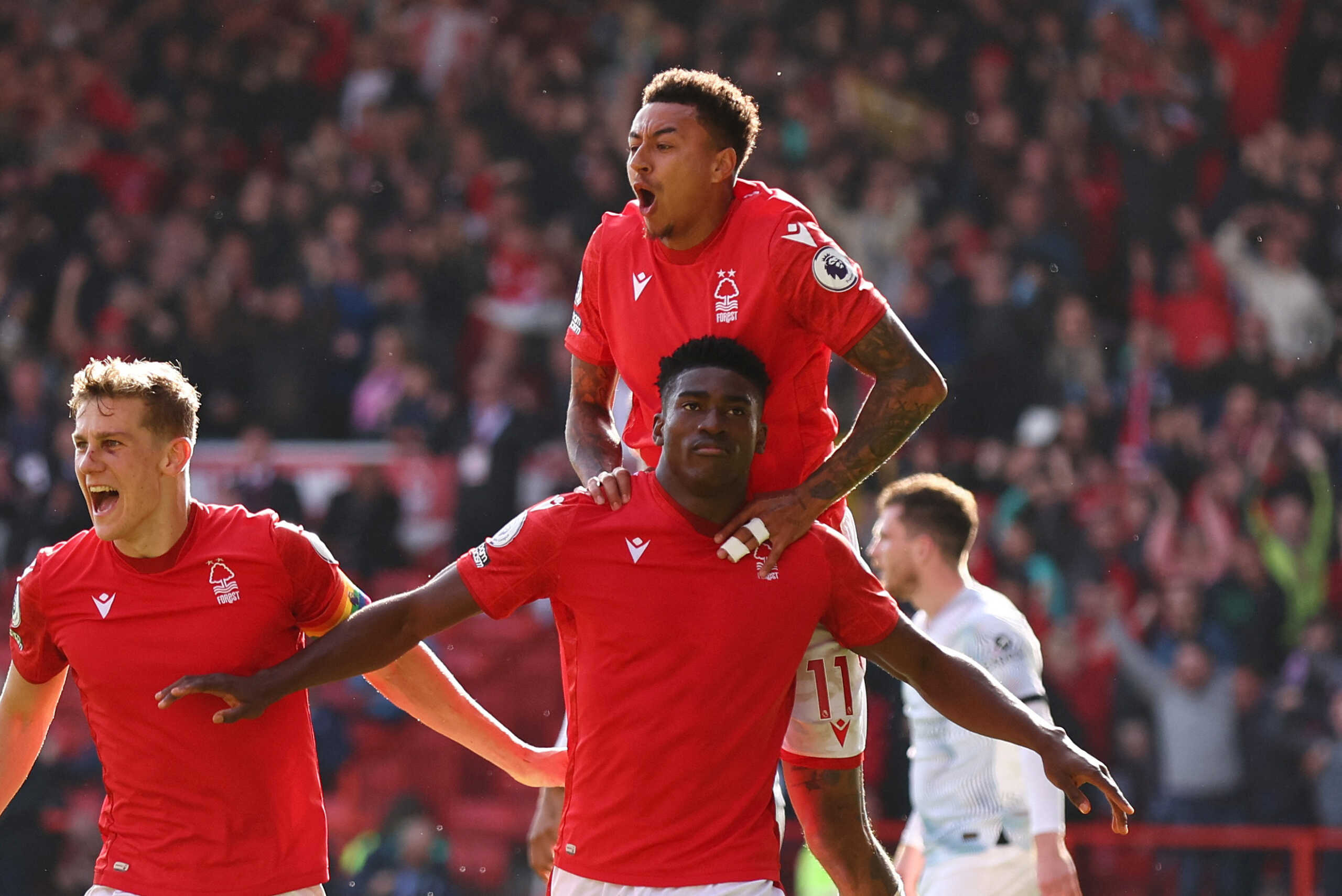 Soccer Football - Premier League - Nottingham Forest v Liverpool - The City Ground, Nottingham, Britain - October 22, 2022 Nottingham Forest's Taiwo Awoniyi celebrates scoring their first goal with Jesse Lingard REUTERS