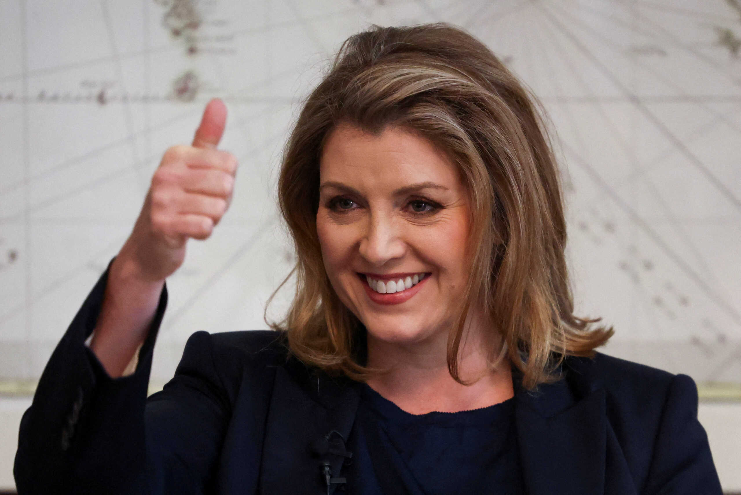 FILE PHOTO: British Conservative MP Penny Mordaunt gestures at an event to launch her campaign to be the next Conservative leader and Prime Minister, in London, Britain July 13, 2022. REUTERS