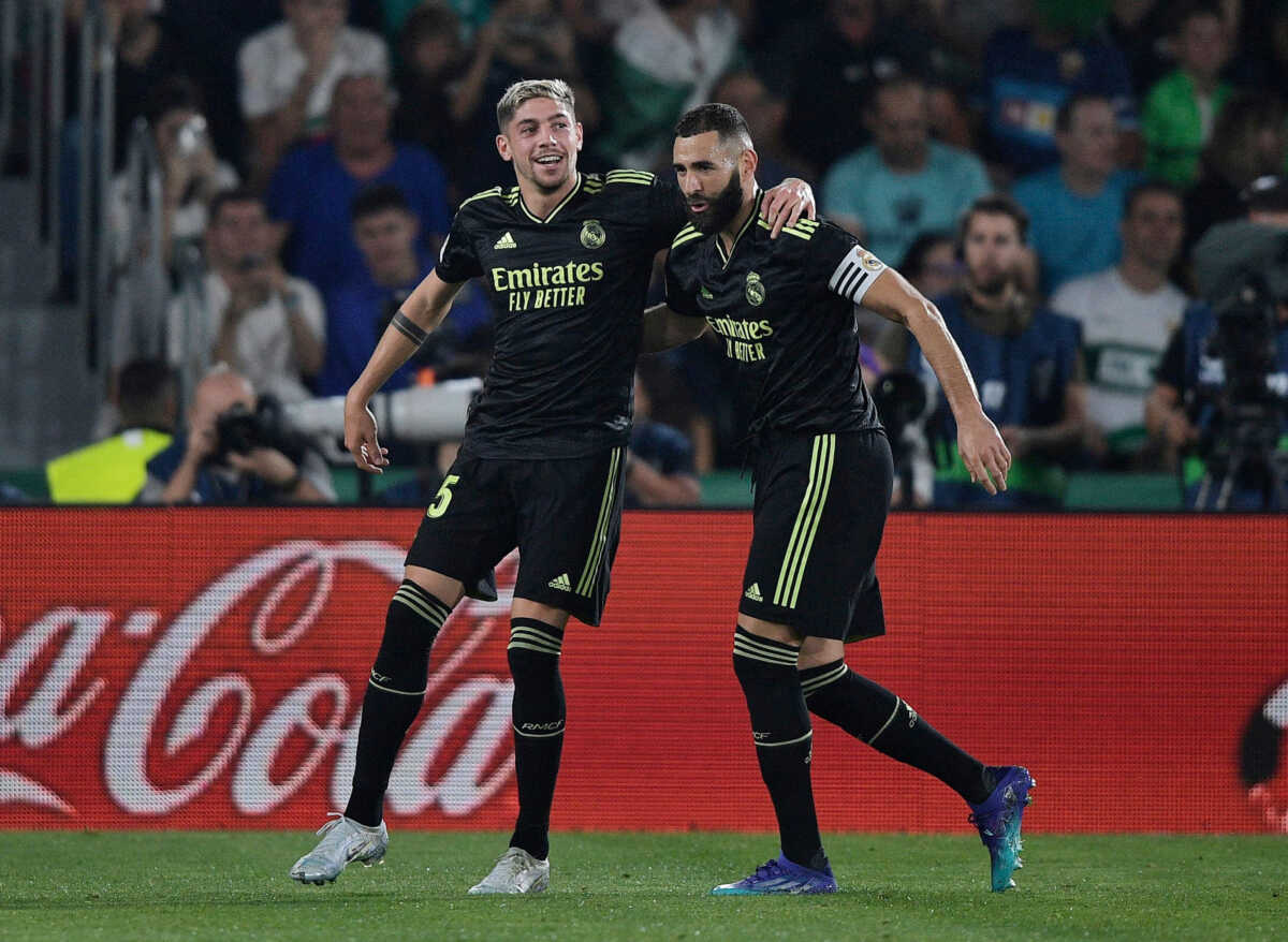 Soccer Football - LaLiga - Elche v Real Madrid - Estadio Manuel Martinez Valero, Elche, Spain - October 19, 2022 Real Madrid's Federico Valverde celebrates scoring their first goal with teammate Karim Benzema REUTERS