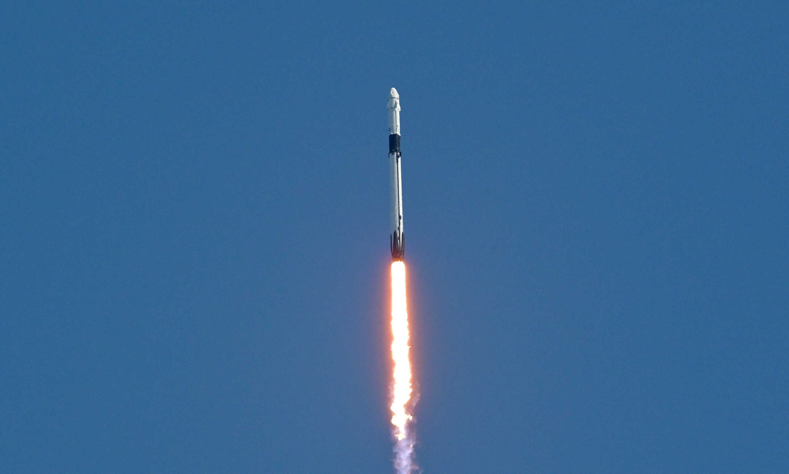 A SpaceX Falcon 9 rocket with the Dragon capsule launches from Pad-39A on the Crew 5 mission carrying crew members commander Nicole Mann, pilot Josh Cassada,  Roscosmos cosmonaut Anna Kikina and Mission Specialist Koichi Wakata from the Japan Aerospace Exploration Agency (JAXA) to the International Space Station from NASA's Kennedy Space Center in Cape Canaveral, Florida, U.S. October 5, 2022. REUTERS